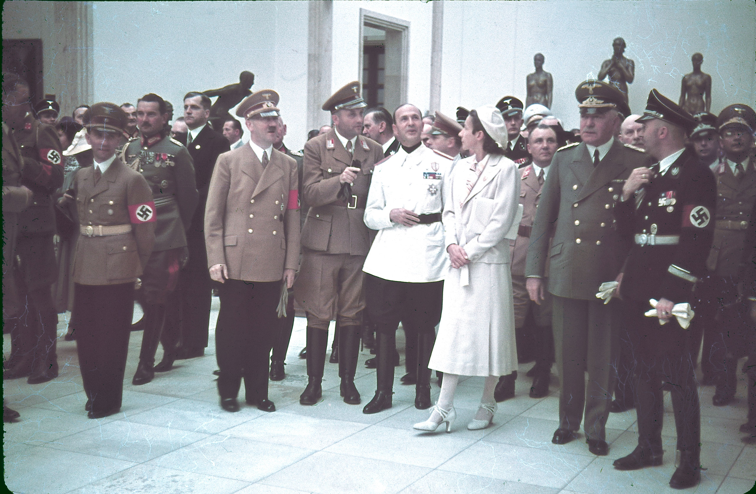 Joseph Goebbels, Eugen Ritter von Schobert, Adolf Hitler, Italian ambassador Dino Alfieri (in white jacket), architect Gerdy Troost, Martin Bormann (behind Troost), Heinrich Himmler (far right) and others at Munich's Haus der Kunst for the 1939 "Day of G