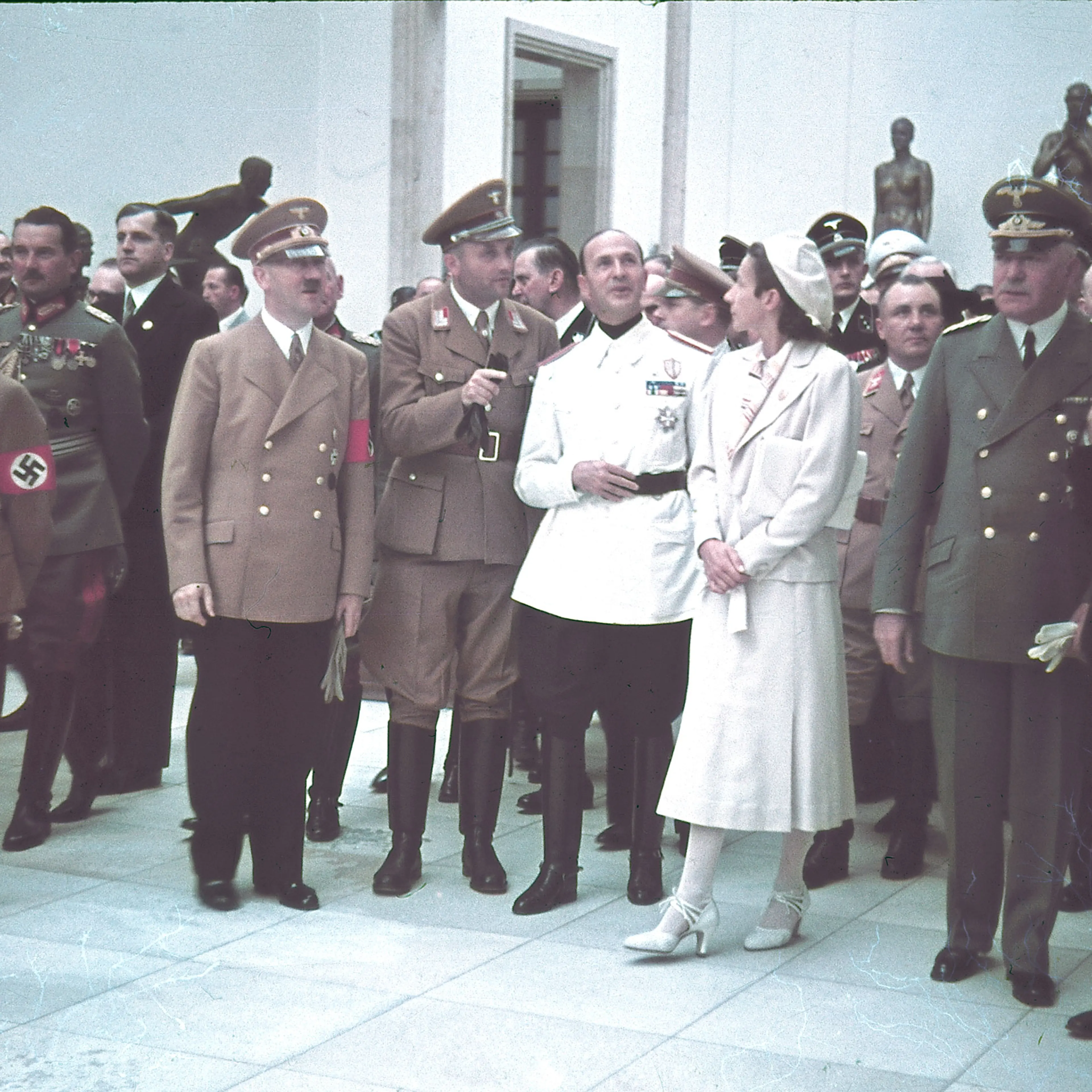 Joseph Goebbels, Eugen Ritter von Schobert, Adolf Hitler, Italian ambassador Dino Alfieri (in white jacket), architect Gerdy Troost, Martin Bormann (behind Troost), Heinrich Himmler (far right) and others at Munich's Haus der Kunst for the 1939 "Day of G