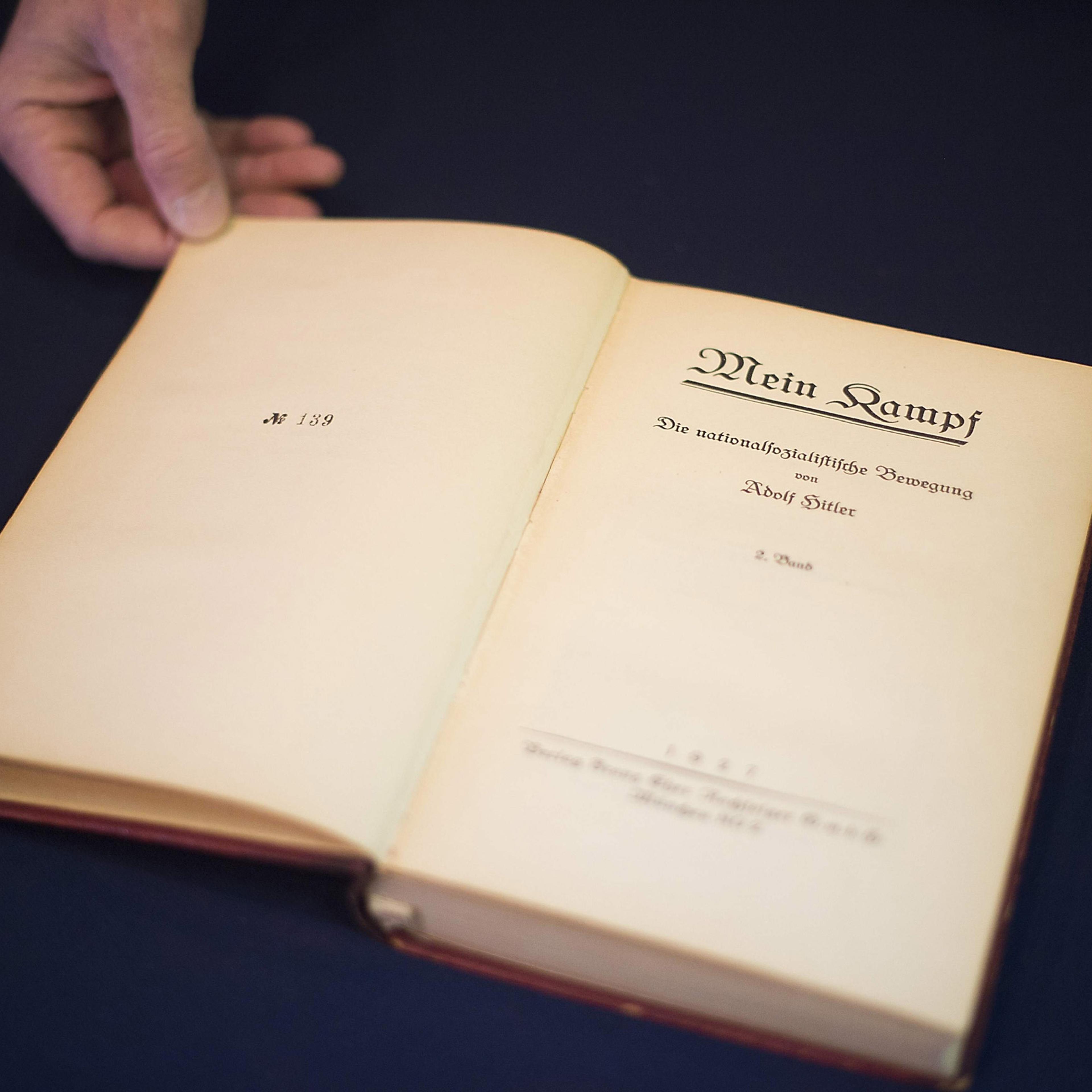 A copy of Nazi leader, Adolf Hitler's, political manifesto Mein Kampf, discovered at his Munich apartment and signed by eleven American officers, is on display March 18, 2016 before auction at Alexander Historical Auctions in Chesapeake City, Maryland. /