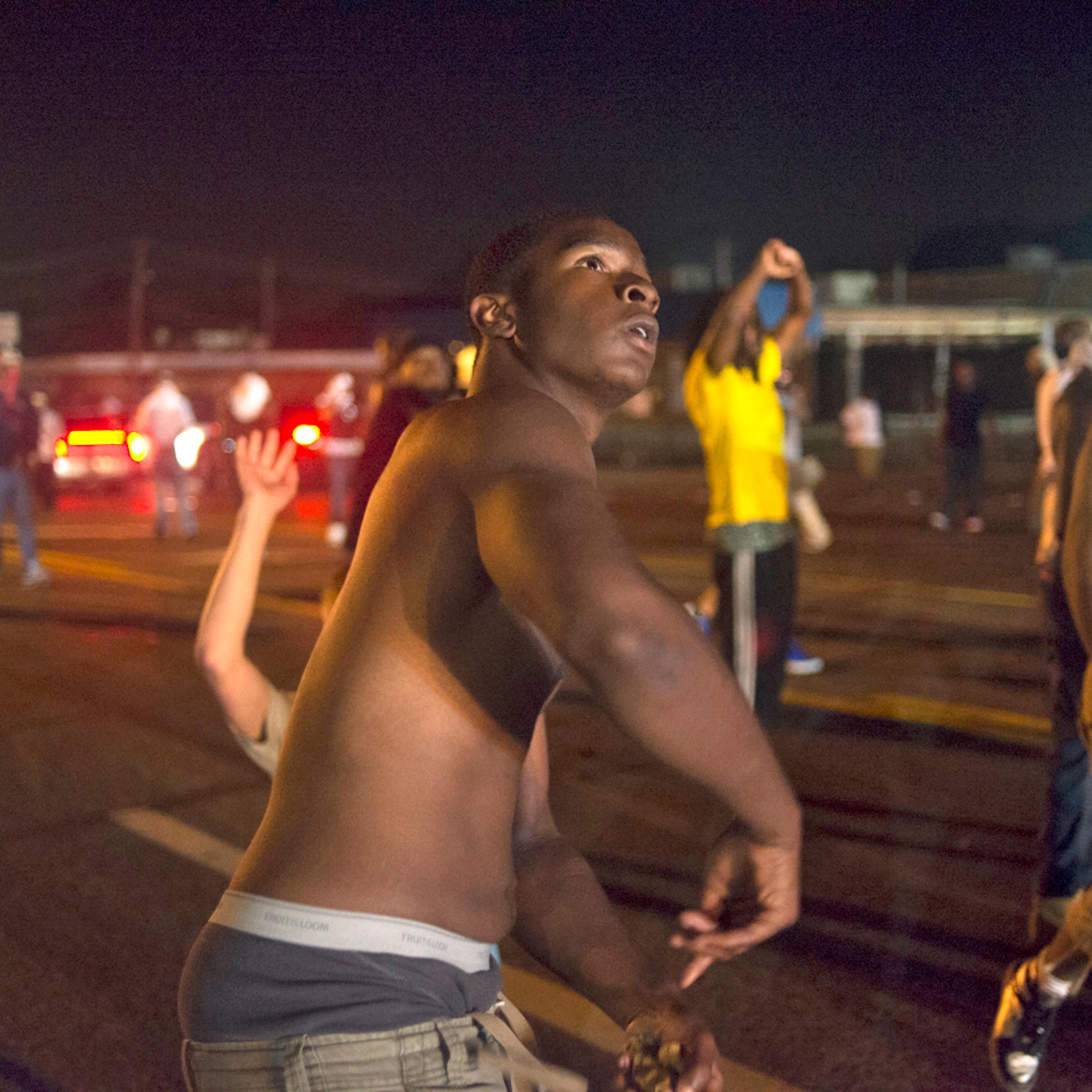 Thousands of people demonstrated today in support of Mike Brown who was gunned down in Ferguson, Missouri 9 days ago. About 8:30 a large protest march was organized in which approximately 1 - 2000 people participated. The group marched to the State Polic