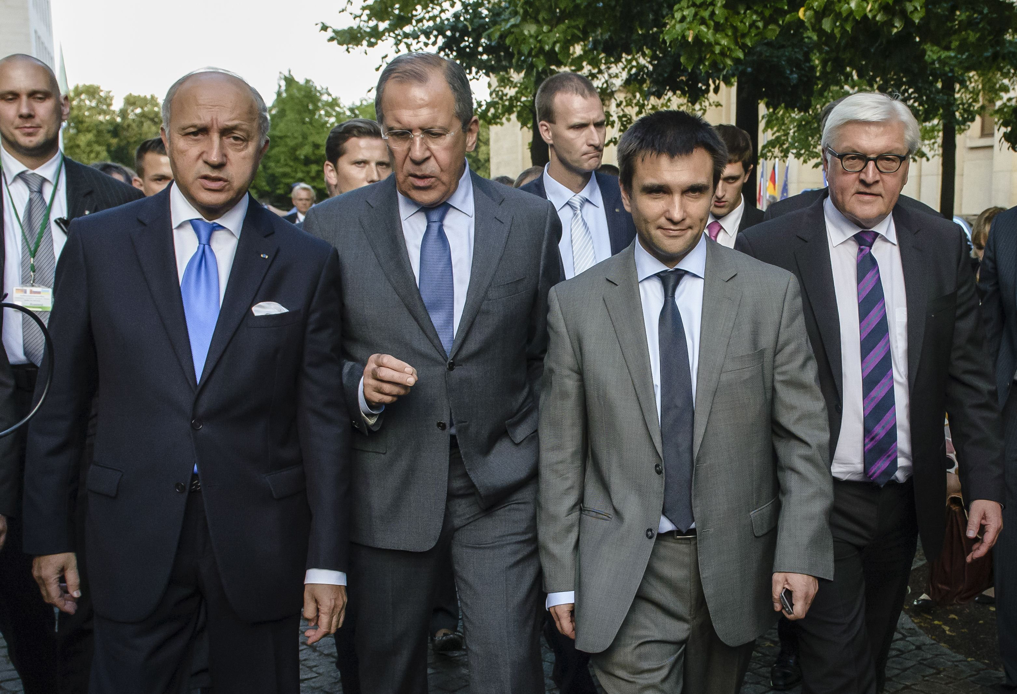French Foreign Minister Laurent Fabius, Russian Foreign Minister Sergei Lavrov, Ukrainian Foreign Minister Pavlo Klimkin and German Foreign Minister Frank-Walter Steinmeier leave the Federal Foreign Office after a joint press conference in Berlin on July