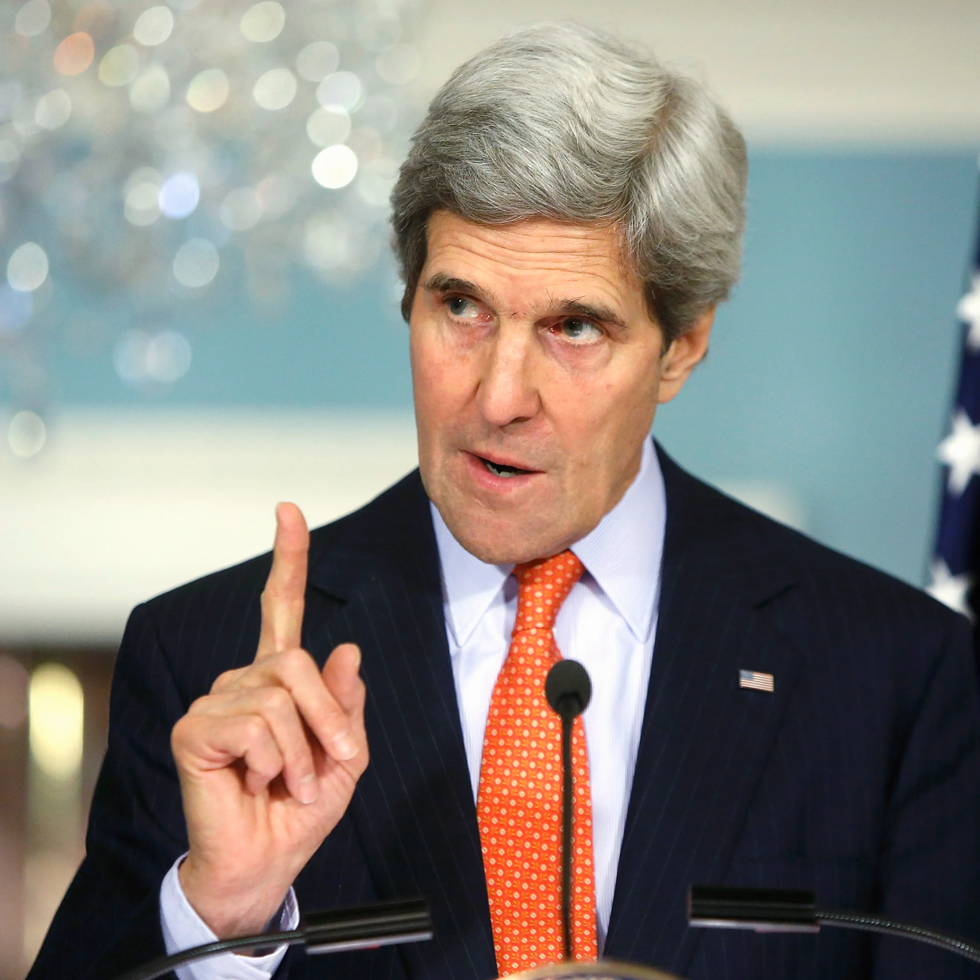 U.S. Secretary of State Kerry gestures as he addresses reporters alongside South Korea's Foreign Minister Yun at the State Department in Washington