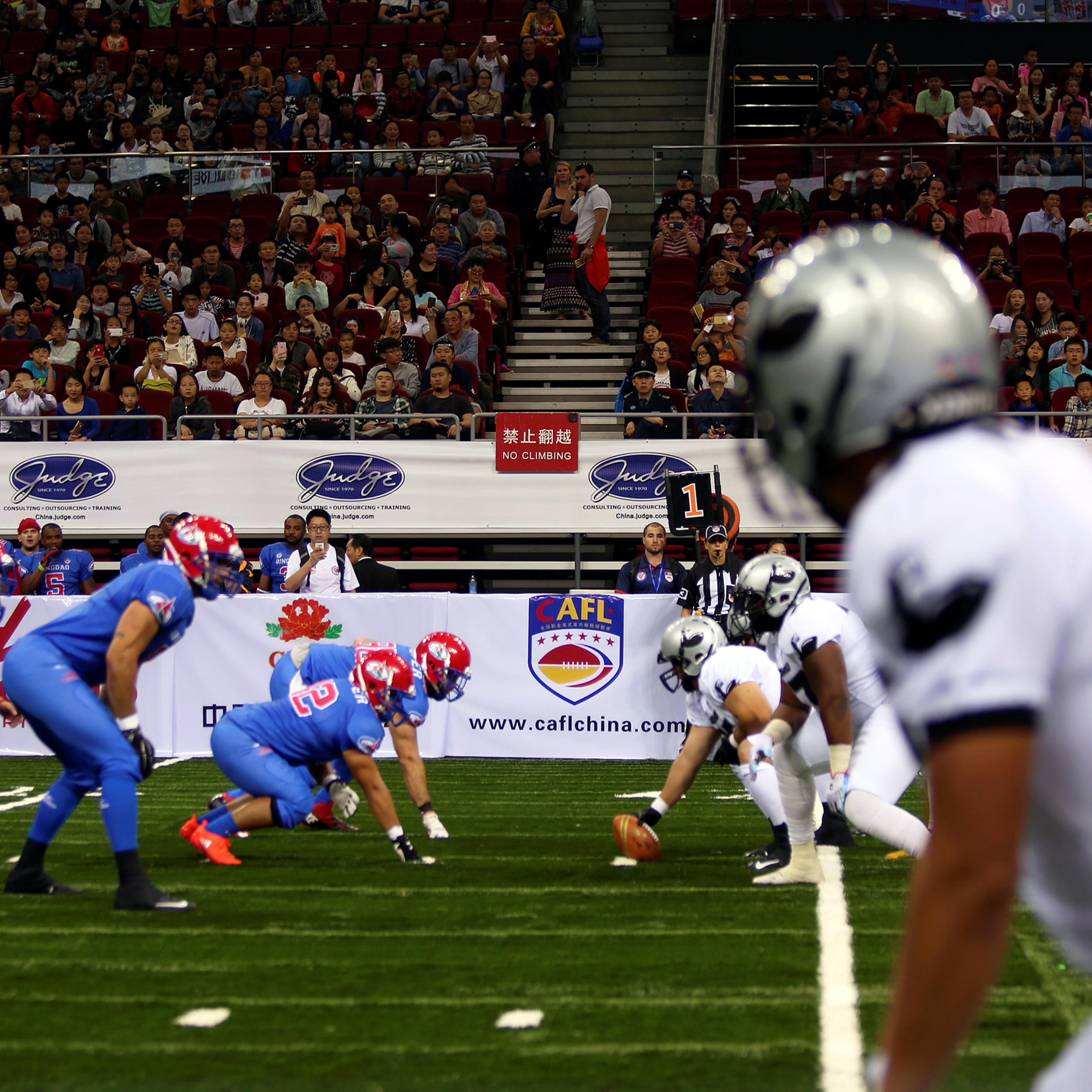 Arena Football - Qingdao v Guangzhou - China Arena Football League Super Series One - LeSports Center, Beijing, China - 1/10/16 Spectators watch teams Qingdao and Guangzhou in action. REUTERS/Iris Zhao - RTSQB7K