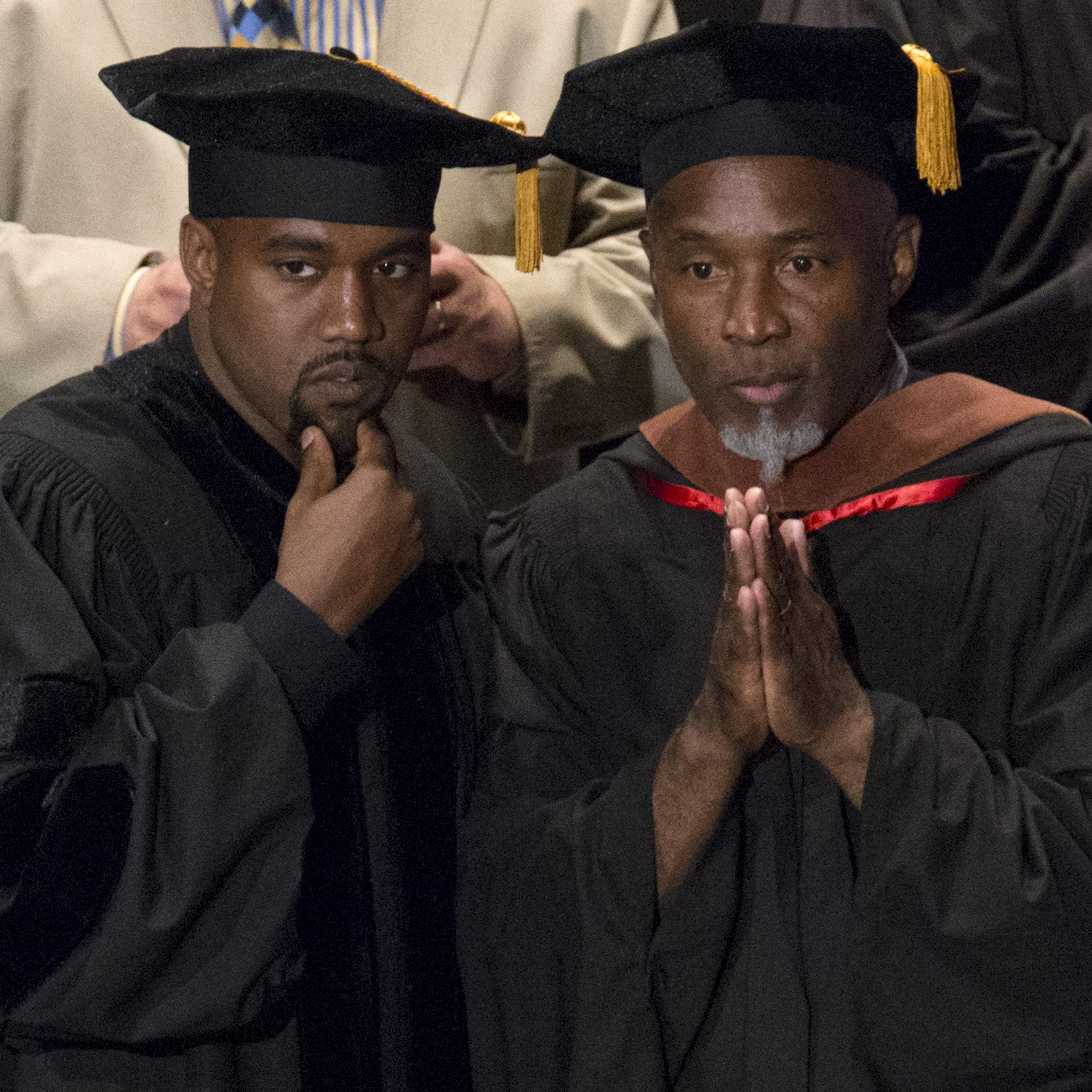Musician Kanye West and School of the Art Institute of Chicago Professor Nick Cave attend the school's annual commencement ceremony where West received an honorary doctorate degree in Chicago, Illinois on May 11, 2015