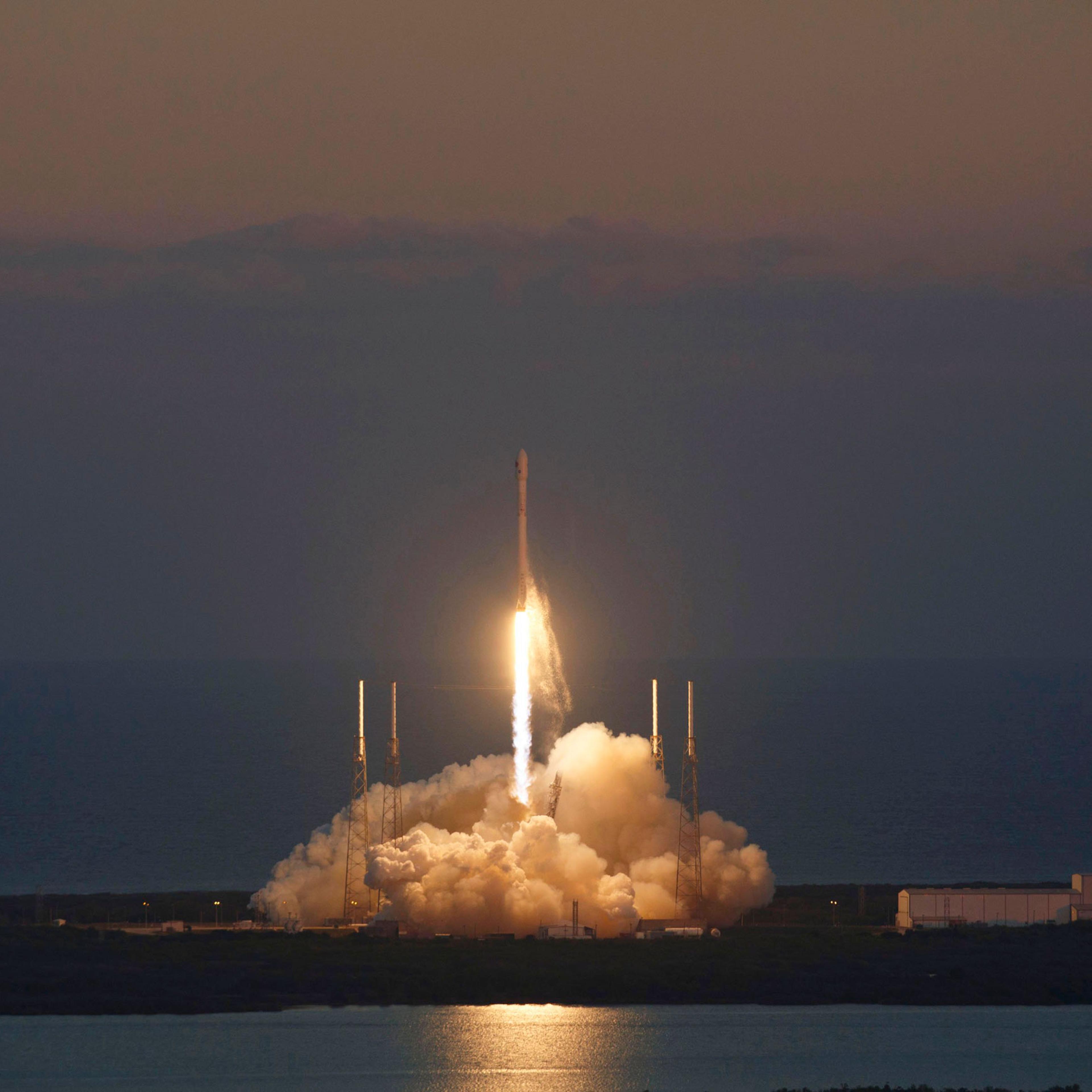The unmanned Falcon 9 rocket, launched by SpaceX and carrying NOAA's Deep Space Climate Observatory Satellite, lifts off from launch pad 40 at the Cape Canaveral Air Force Station in Cape Canaveral, Fla., on Feb. 11, 2015.
