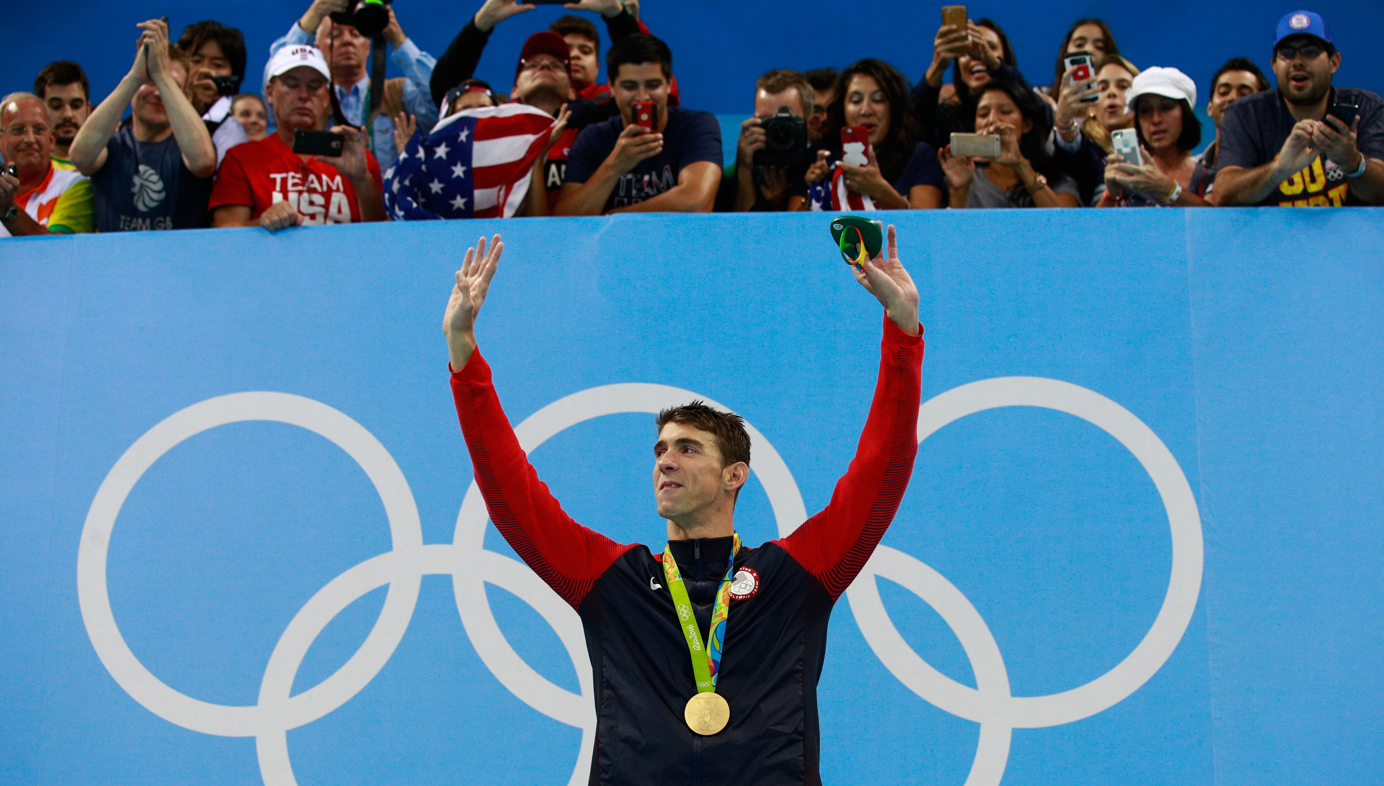 Michael Phelps poses on the podium during the medal ceremony for the Men's 200m Individual Medley Final at the Rio Olympic Games on Aug. 11, 2016 in Rio de Janeiro.