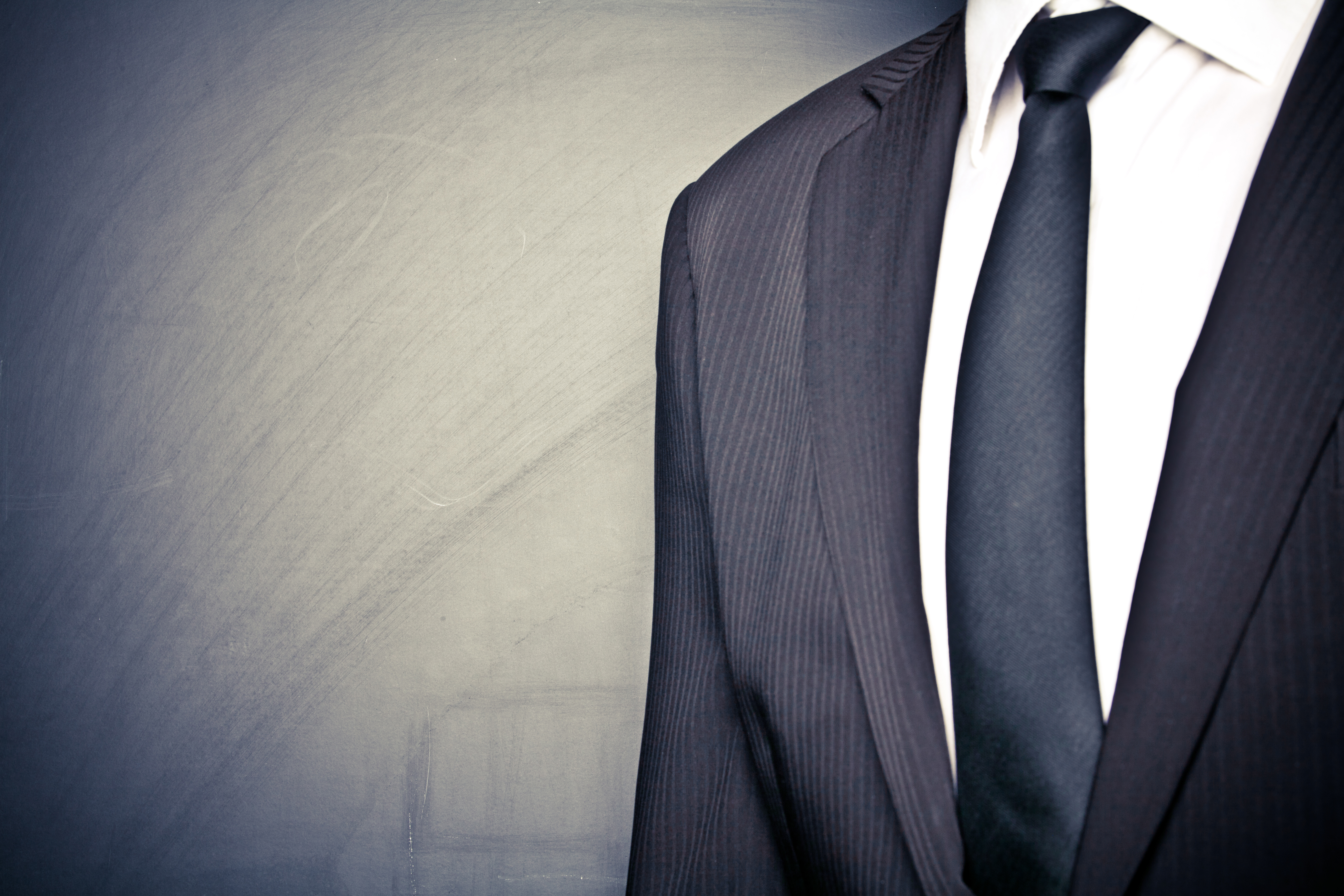 Businessman Front of Blackboard