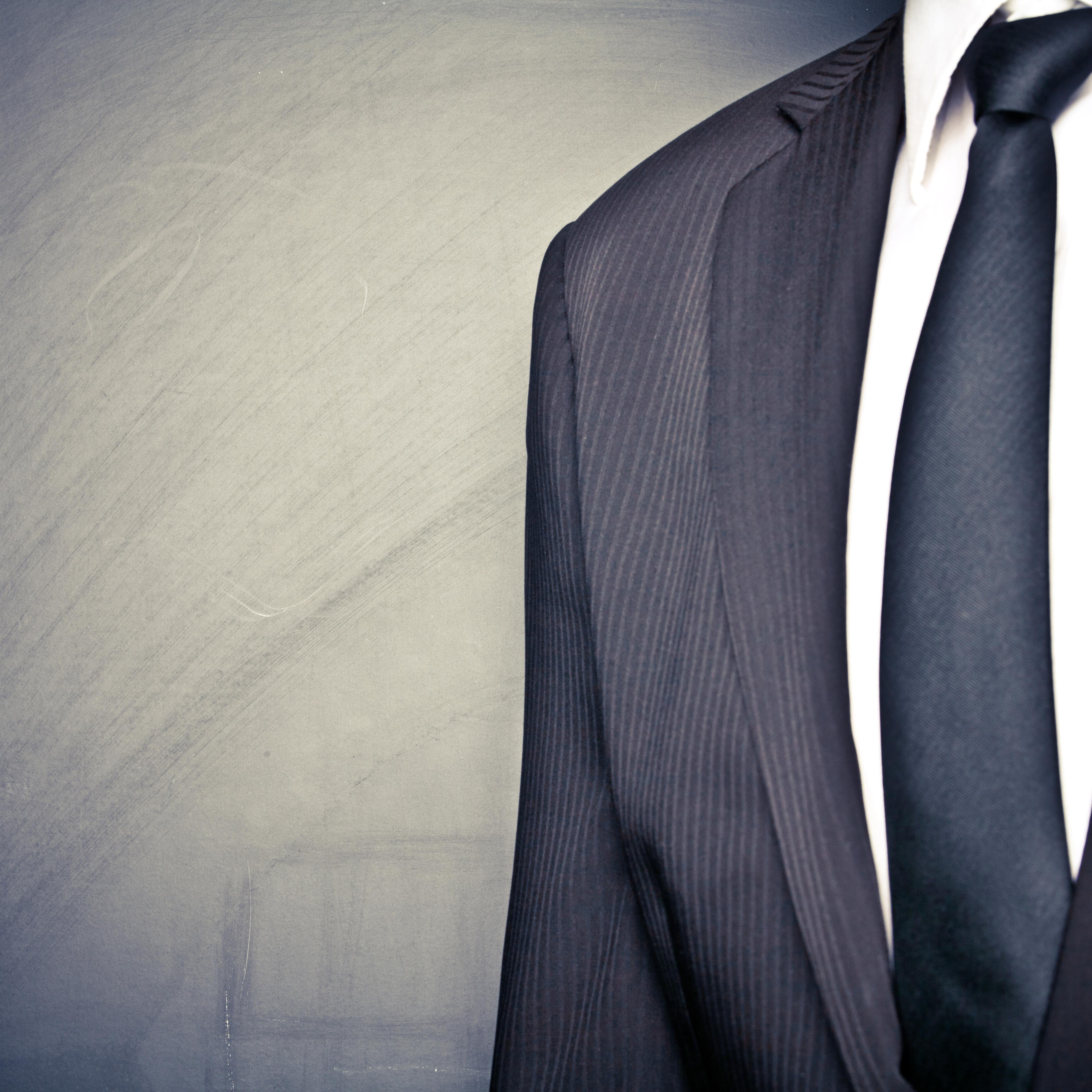 Businessman Front of Blackboard