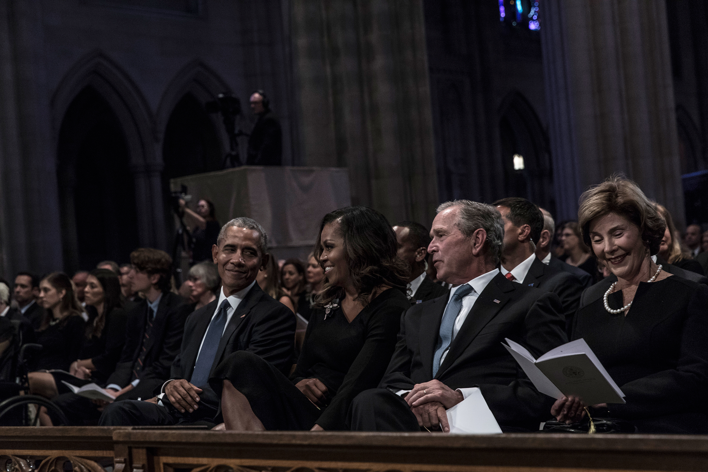 Former US President Barack Obama, Michelle Obama, former President George W. Bush and Laura Bush during a memorial service for Senator John McCain at the Washington National Cathedral on September 1, 2018. 