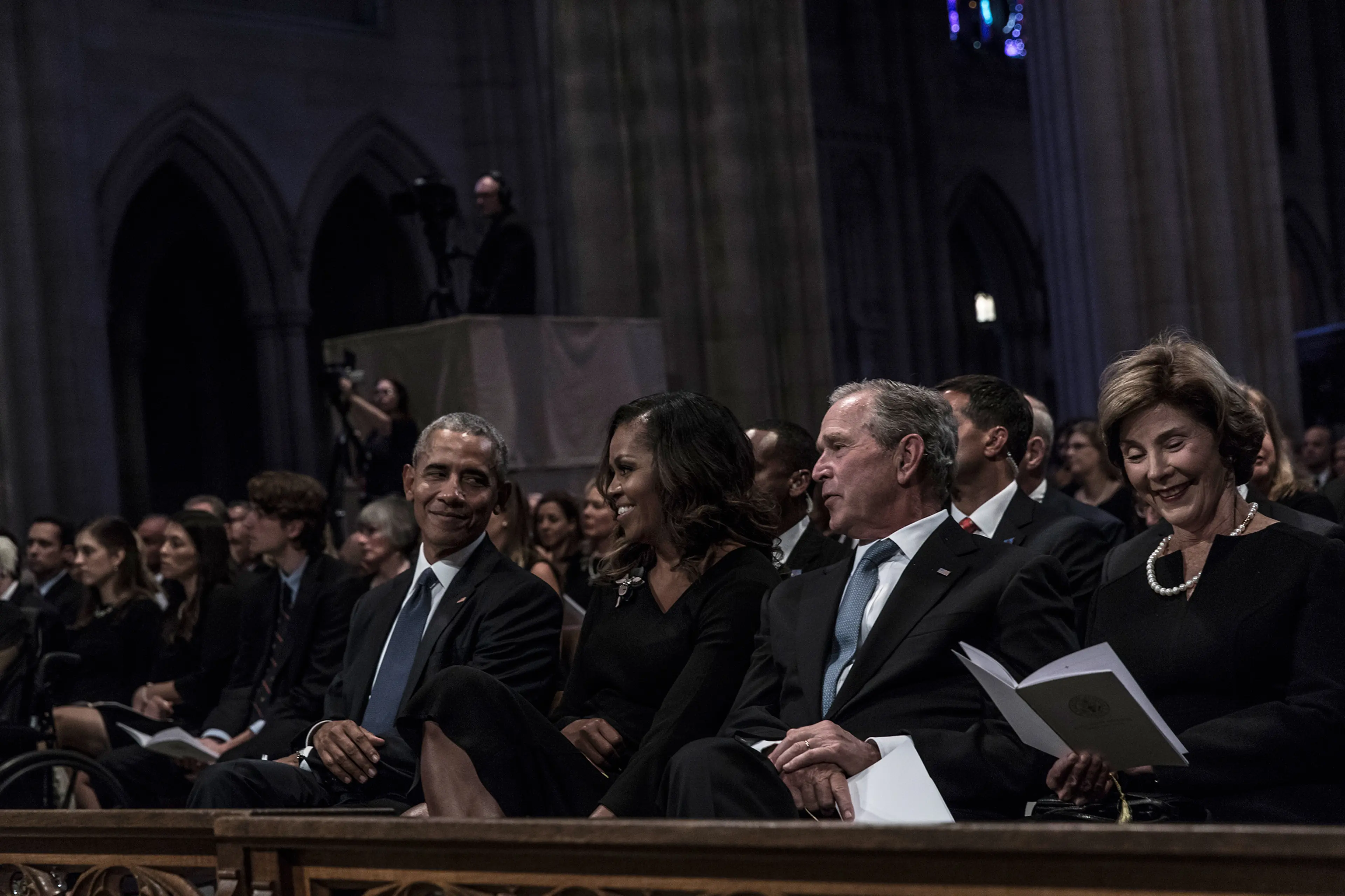 Former US President Barack Obama, Michelle Obama, former President George W. Bush and Laura Bush during a memorial service for Senator John McCain at the Washington National Cathedral on September 1, 2018.