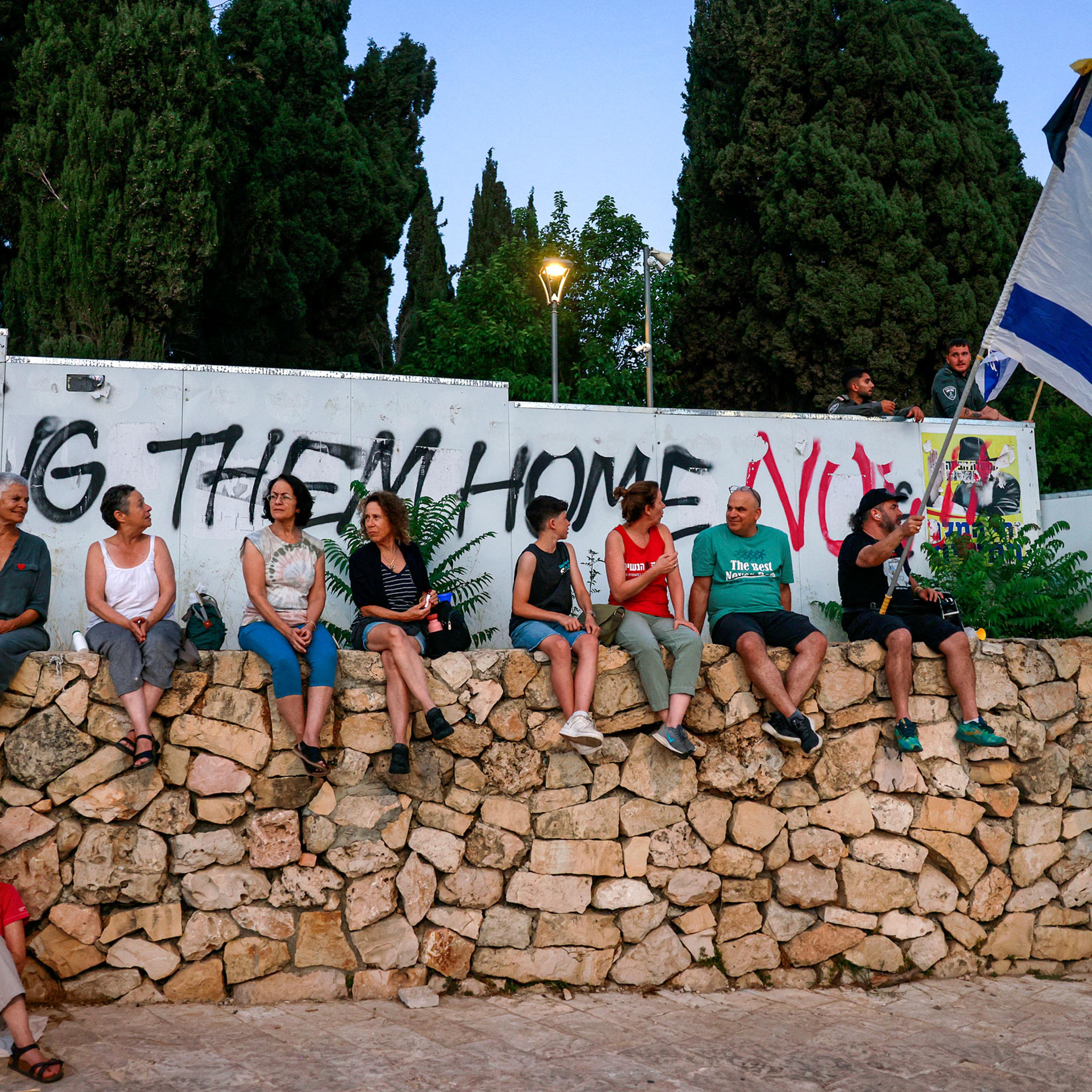 Protesters gather during an anti-government rally calling for early elections, outside the Knesset in Jerusalem, on June 18, 2024.