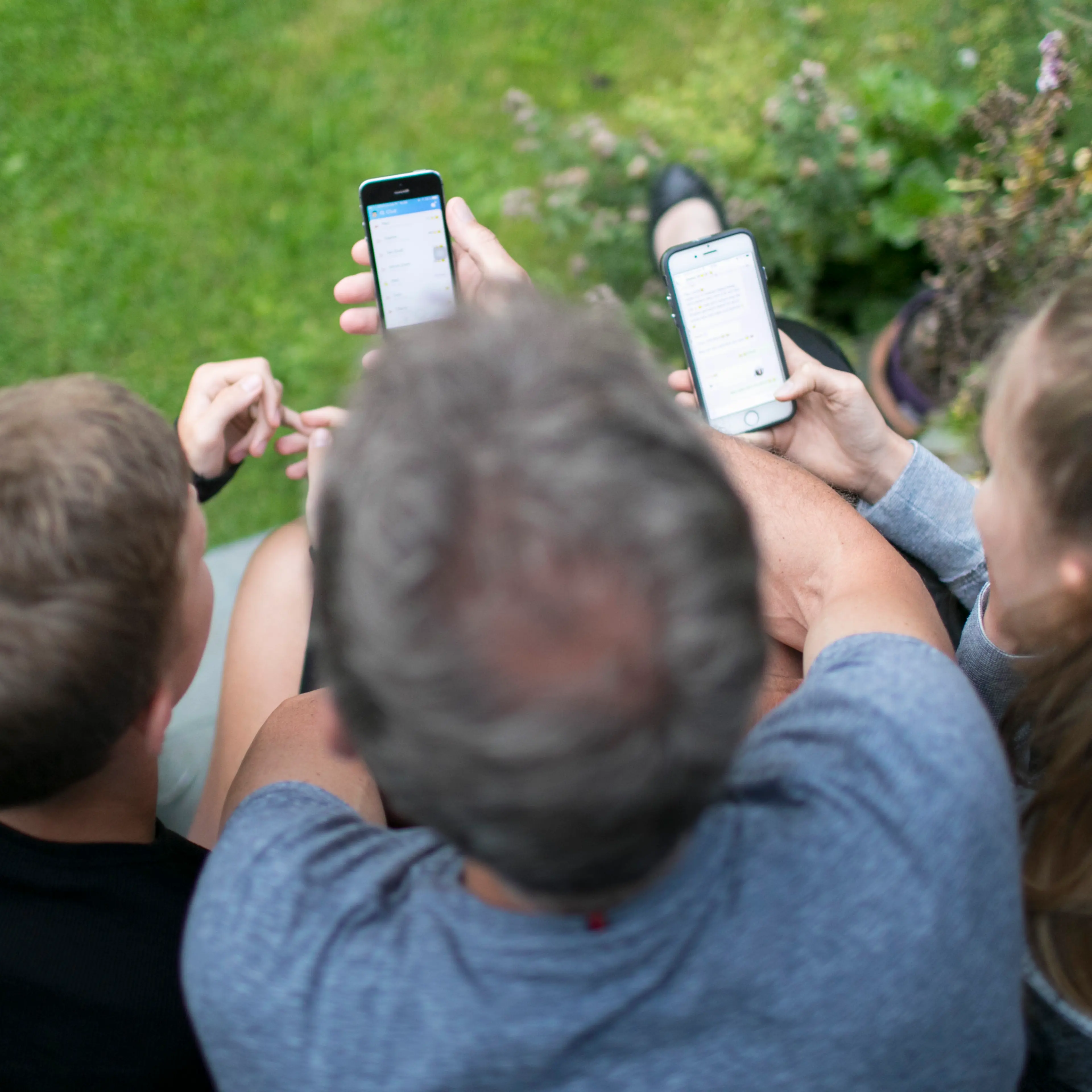 family with smartphones