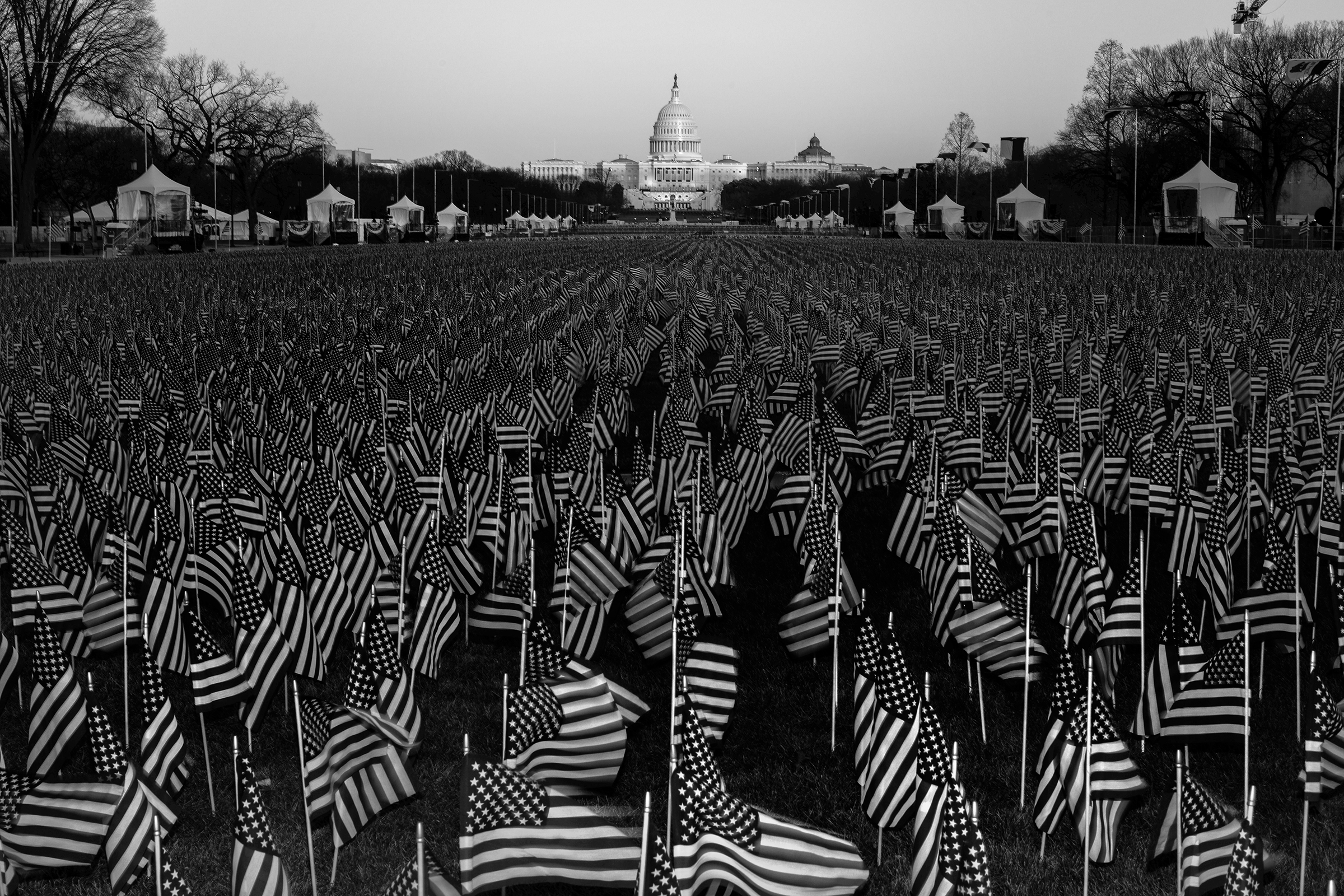 A field of flags on the National Mall in Washington, D.C., on Jan. 19, one day before the inauguration of President-elect Joe Biden and Vice President-elect Kamala Harris. The public art display features nearly 200,000 flags, representing Americans who w