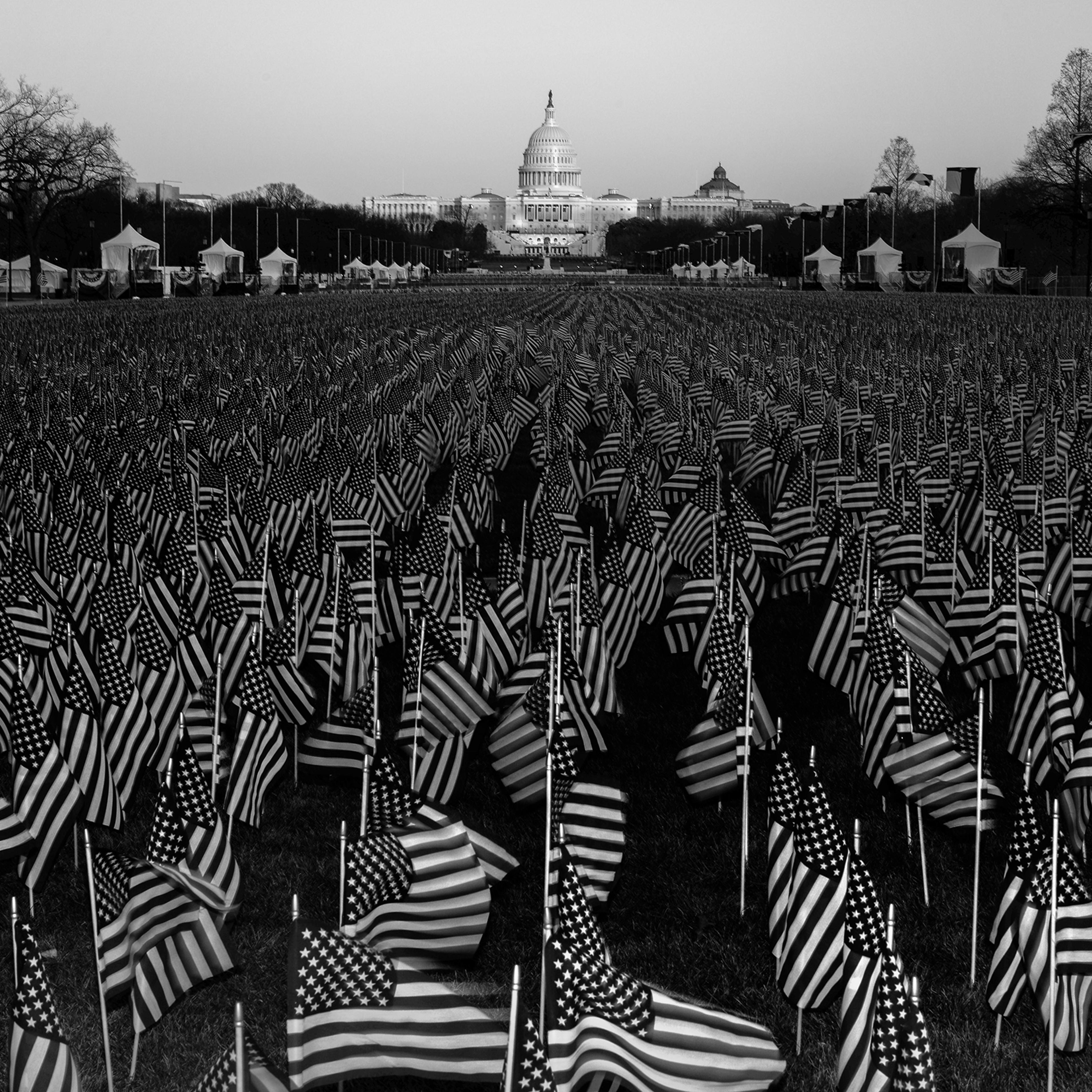 A field of flags on the National Mall in Washington, D.C., on Jan. 19, one day before the inauguration of President-elect Joe Biden and Vice President-elect Kamala Harris. The public art display features nearly 200,000 flags, representing Americans who w