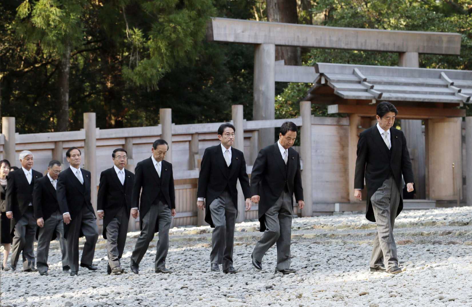 Japanese Prime Minister Shinzo Abe, right, and his Cabinet members visit the Ise shrine in Ise, in central Japan, on Jan. 5, 2015 