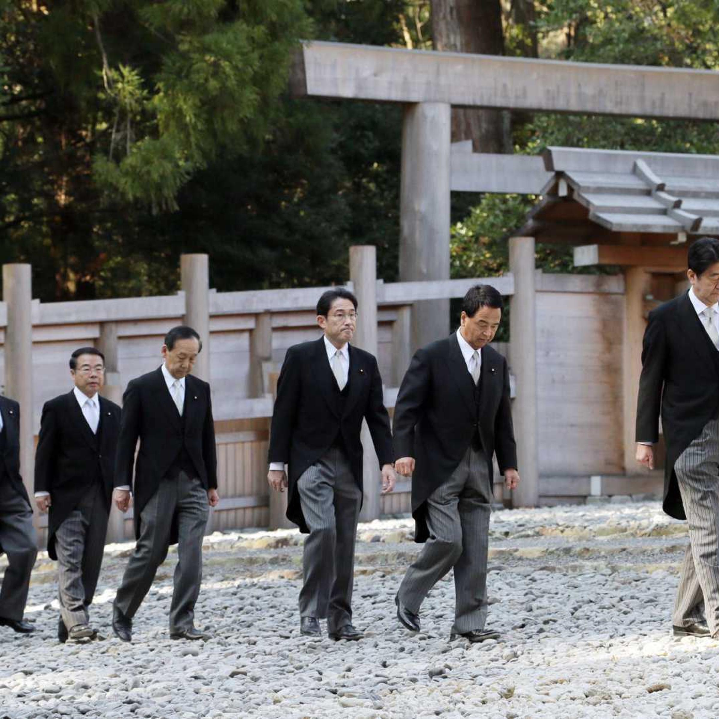 Japanese Prime Minister Shinzo Abe, right, and his Cabinet members visit the Ise shrine in Ise, in central Japan, on Jan. 5, 2015