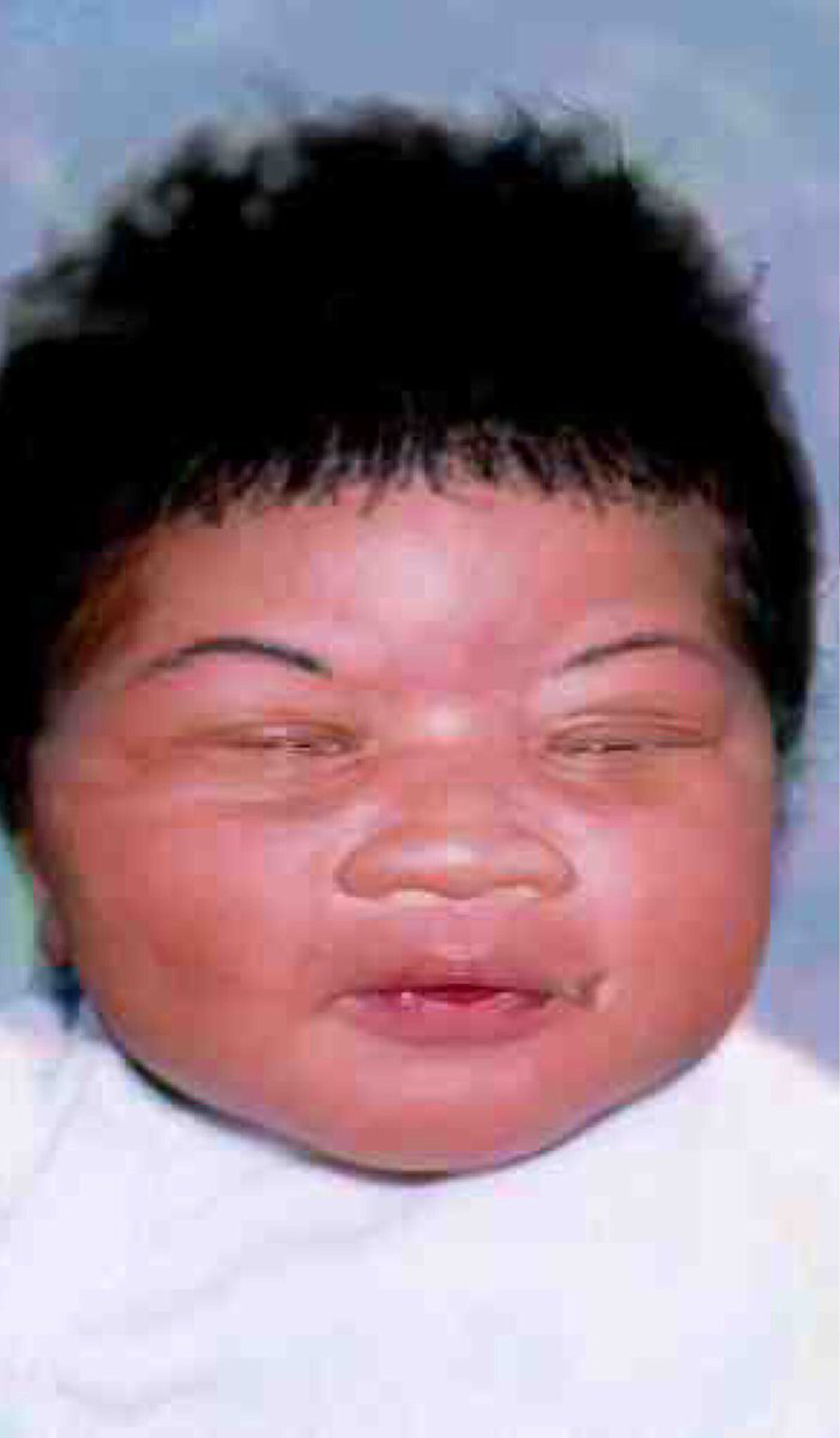 This composite image made available by the Jacksonville Sheriff's Office in Jacksonville, Fla., shows a photo of Kamiyah Mobley, an infant baby girl who was kidnapped by a woman, seen in separate sketches first provided by police in 1998 during the initi
