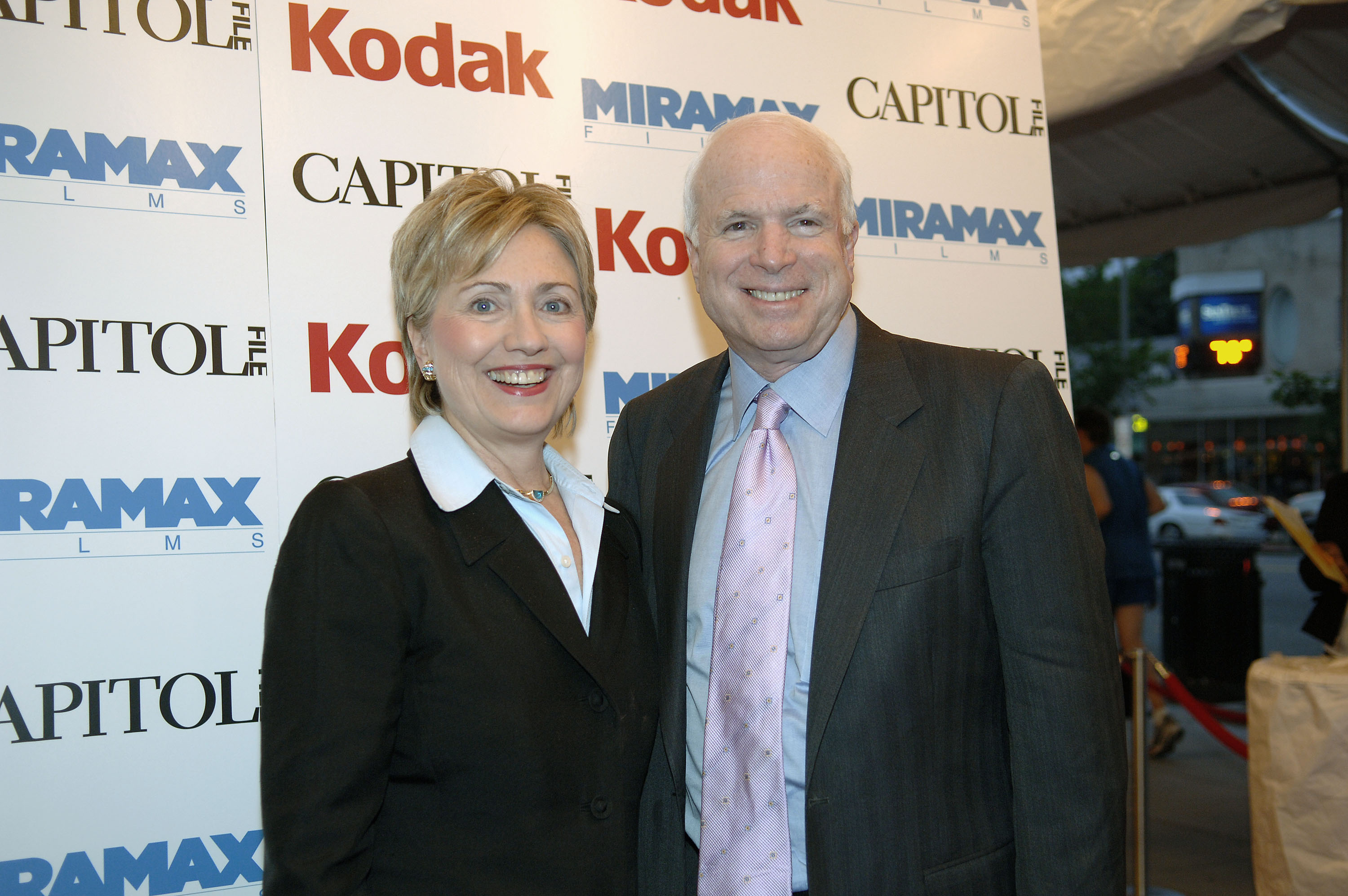 Hillary Clinton and John McCain smiling