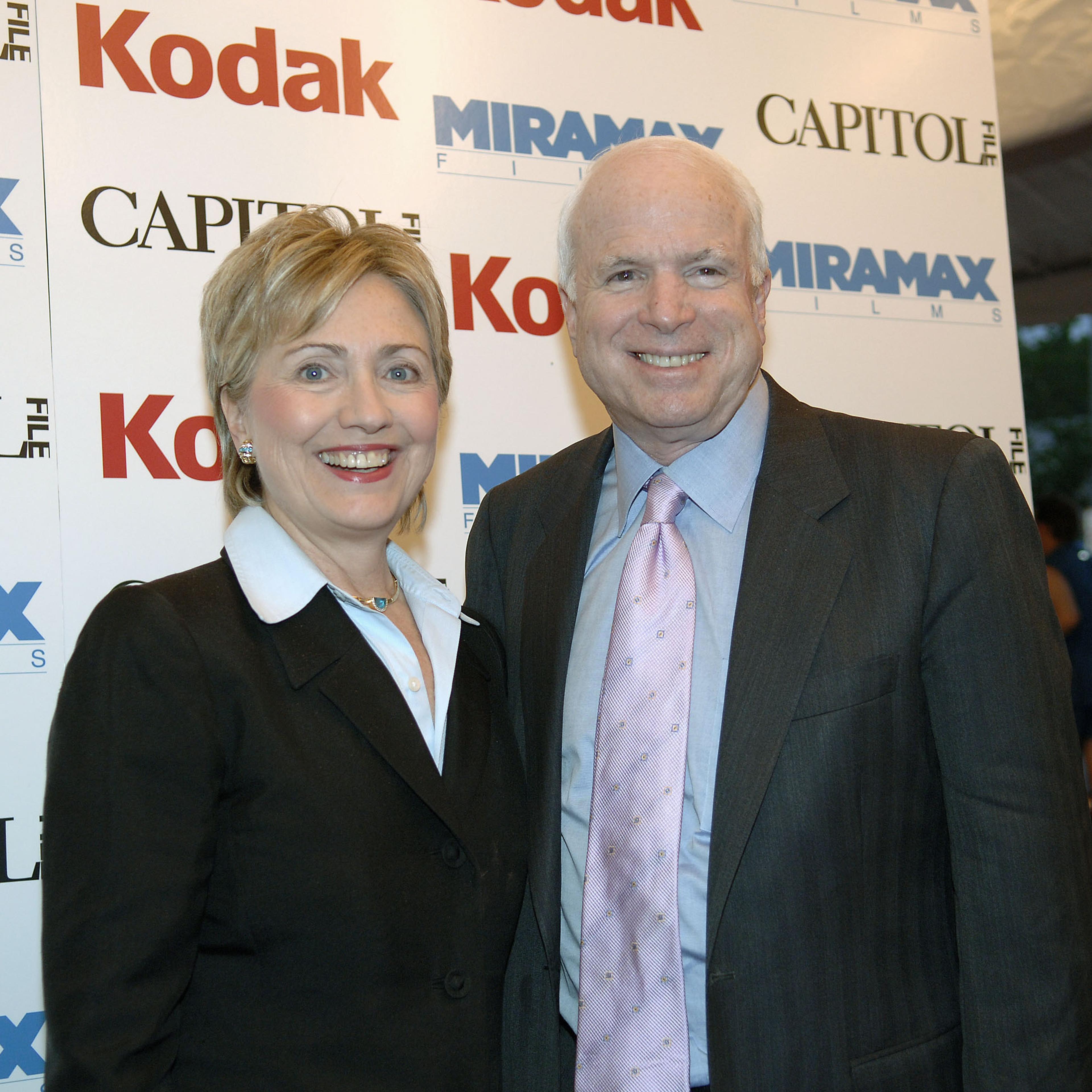 Hillary Clinton and John McCain smiling