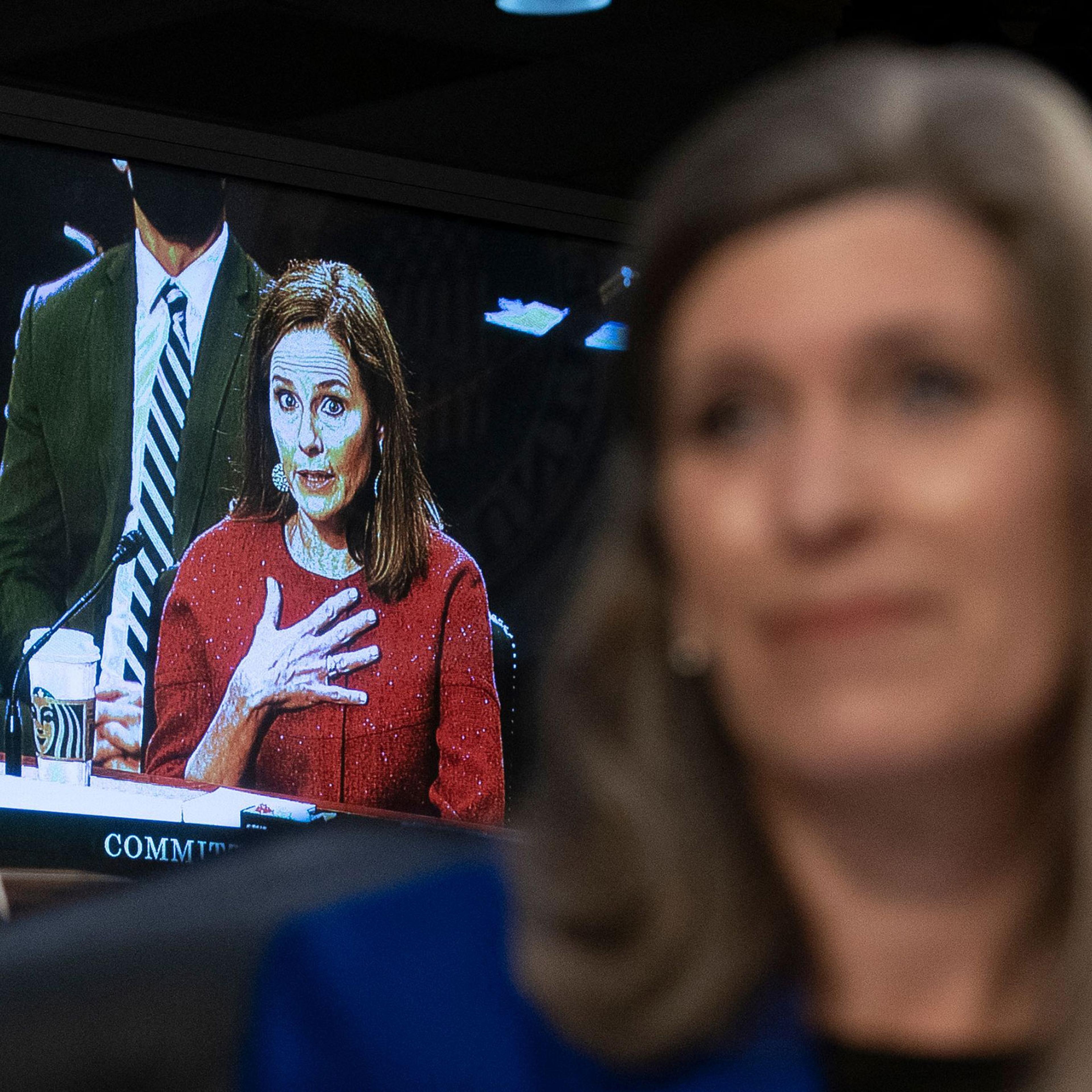 Supreme Court nominee Judge Amy Coney Barrett answers a question from Sen. Joni Ernst on the second day of her Supreme Court confirmation hearings before the Senate Judiciary Committee on Capitol Hill on Oct. 13, 2020.