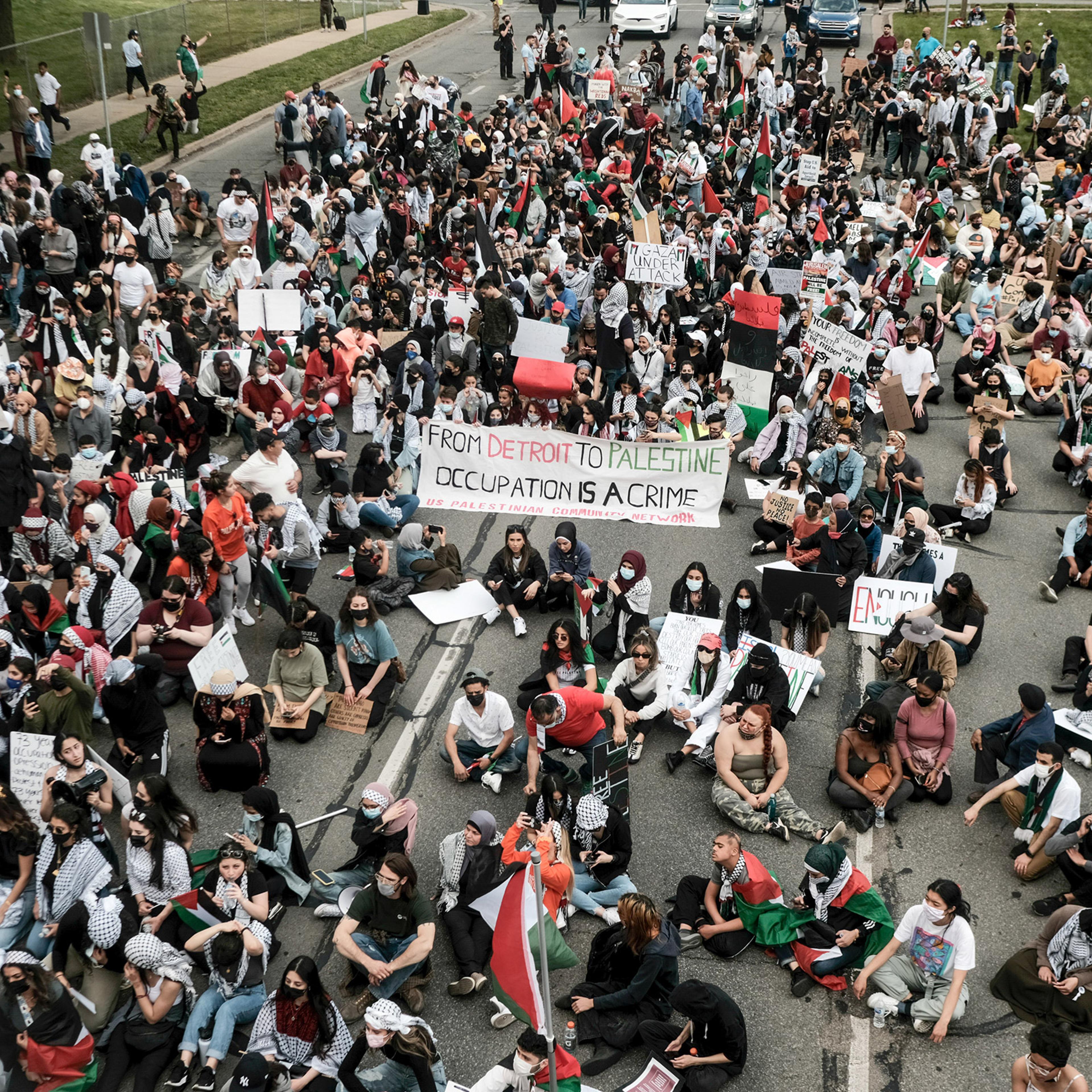 Protesters listen to speeches during a Free Palestine rally in Dearborn, Mich., on May 15, 2021.