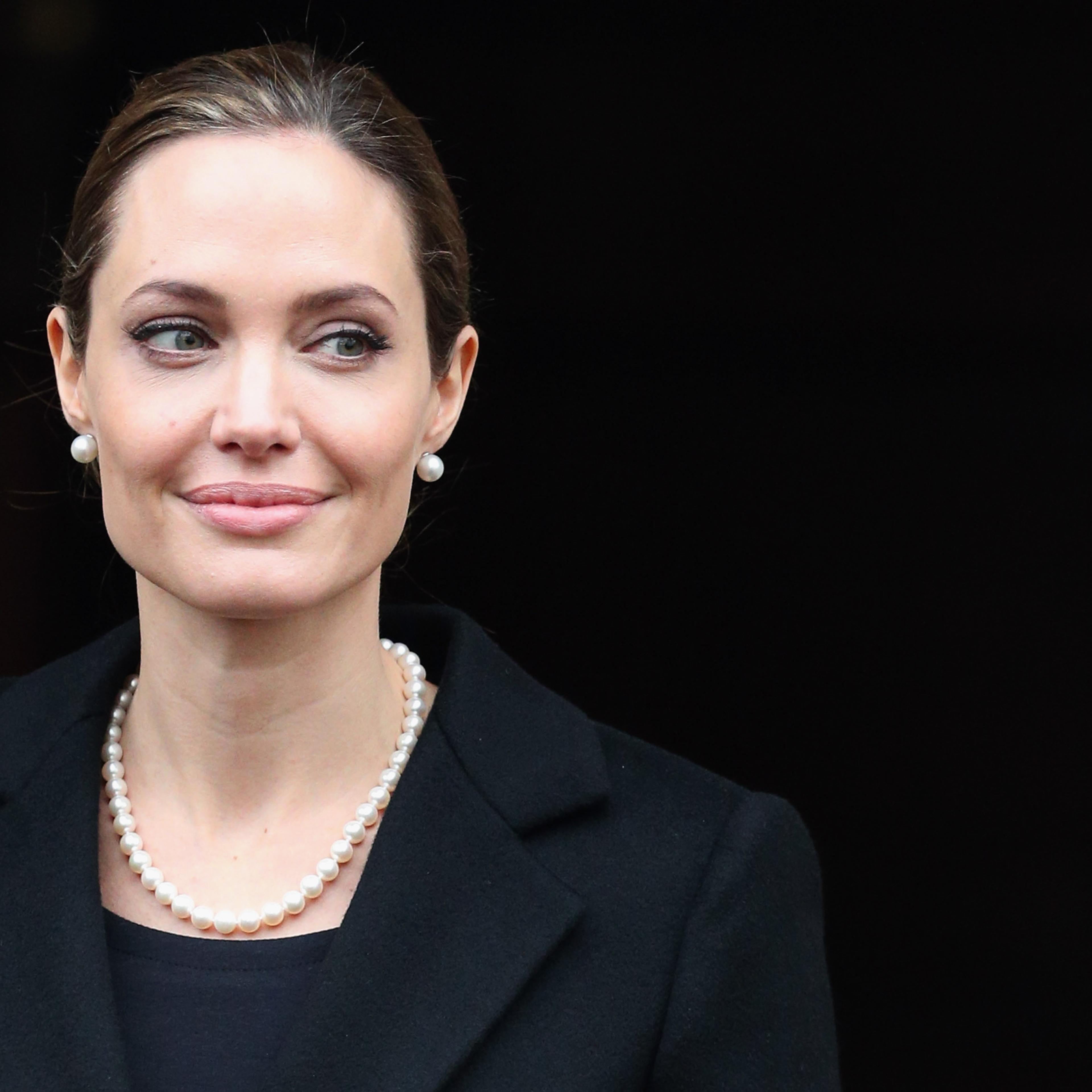 Actress Angelina Jolie leaves Lancaster House after attending the G8 Foreign Minsters' conference on April 11, 2013 in London.