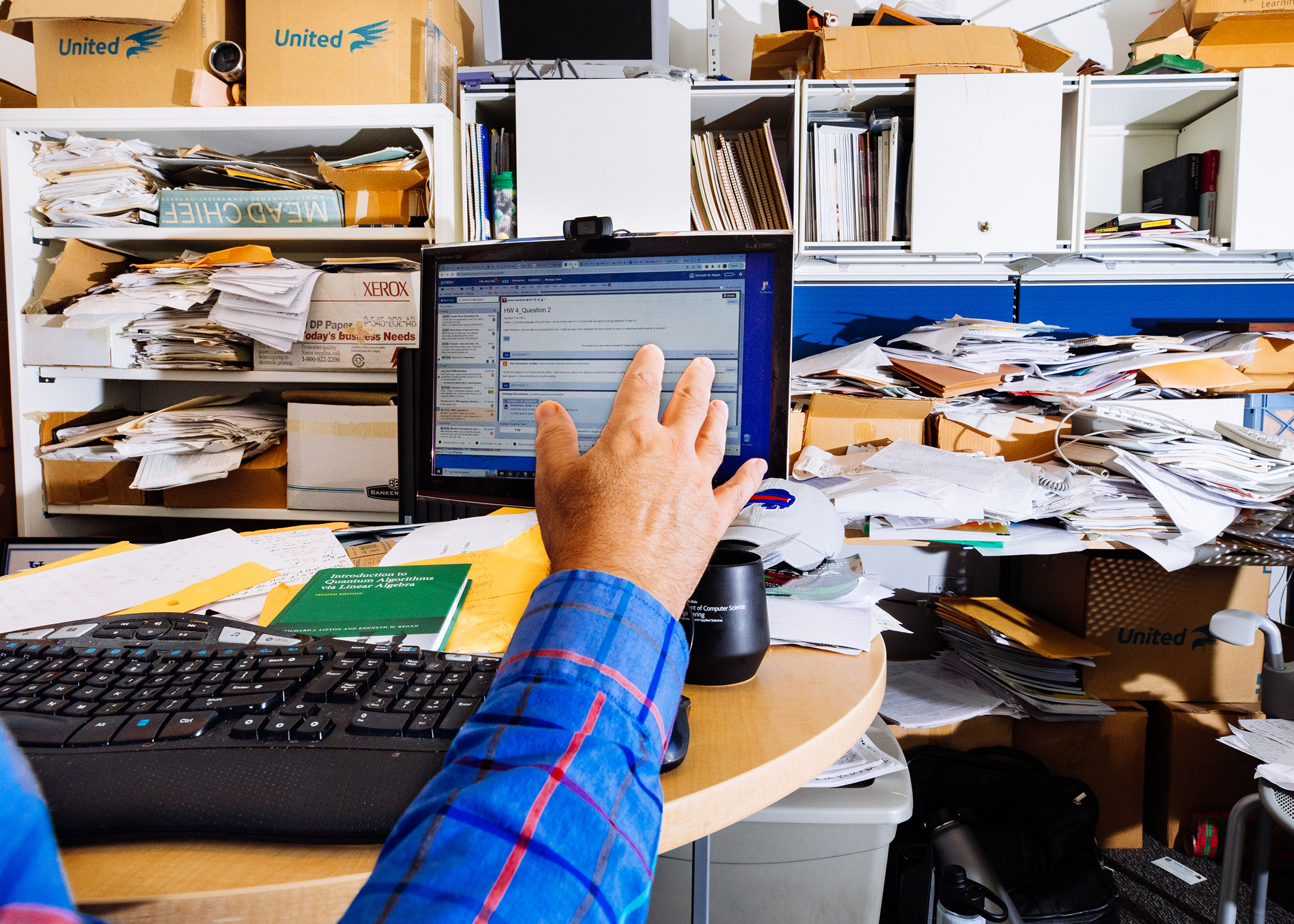 Regan in his office at the University at Buffalo School of Engineering and Applied Sciences.