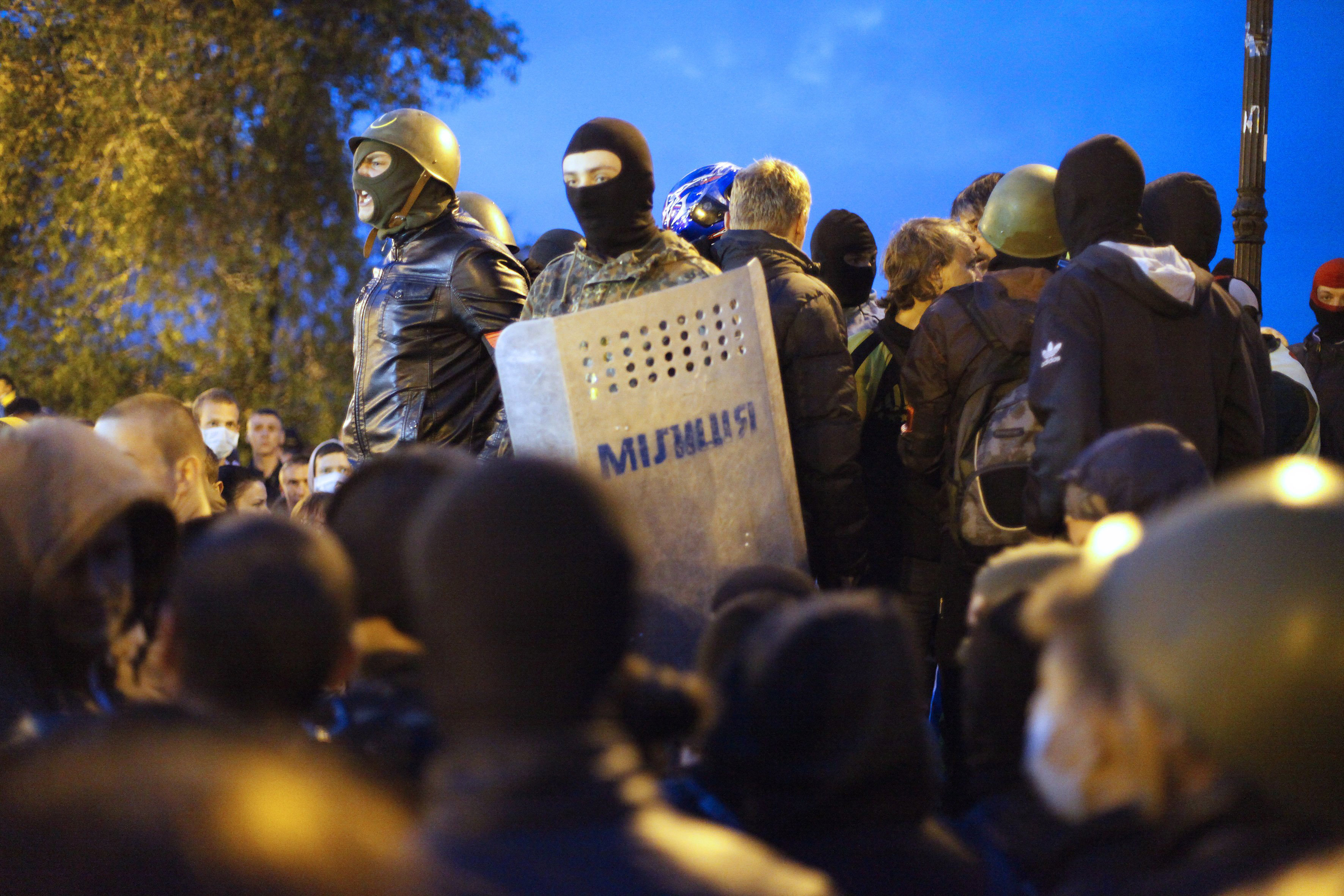 Members of the nationalist political party and paramilitary collective Pravi Sektor rally at Odessa's police headquarters and the burnt-out Trade Unions building in Odessa, Ukraine, on May 4, 2014.