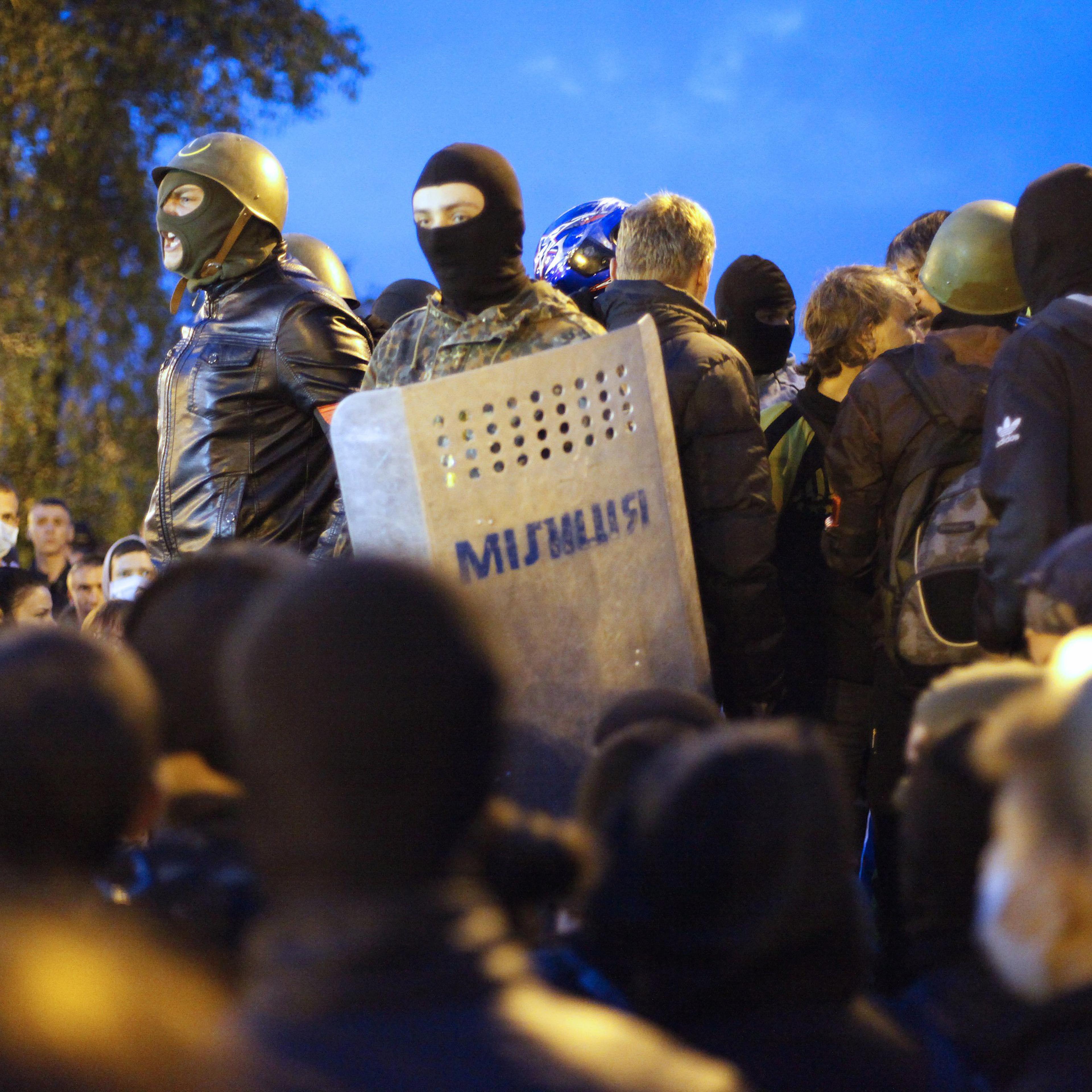 Members of the nationalist political party and paramilitary collective Pravi Sektor rally at Odessa's police headquarters and the burnt-out Trade Unions building in Odessa, Ukraine, on May 4, 2014.