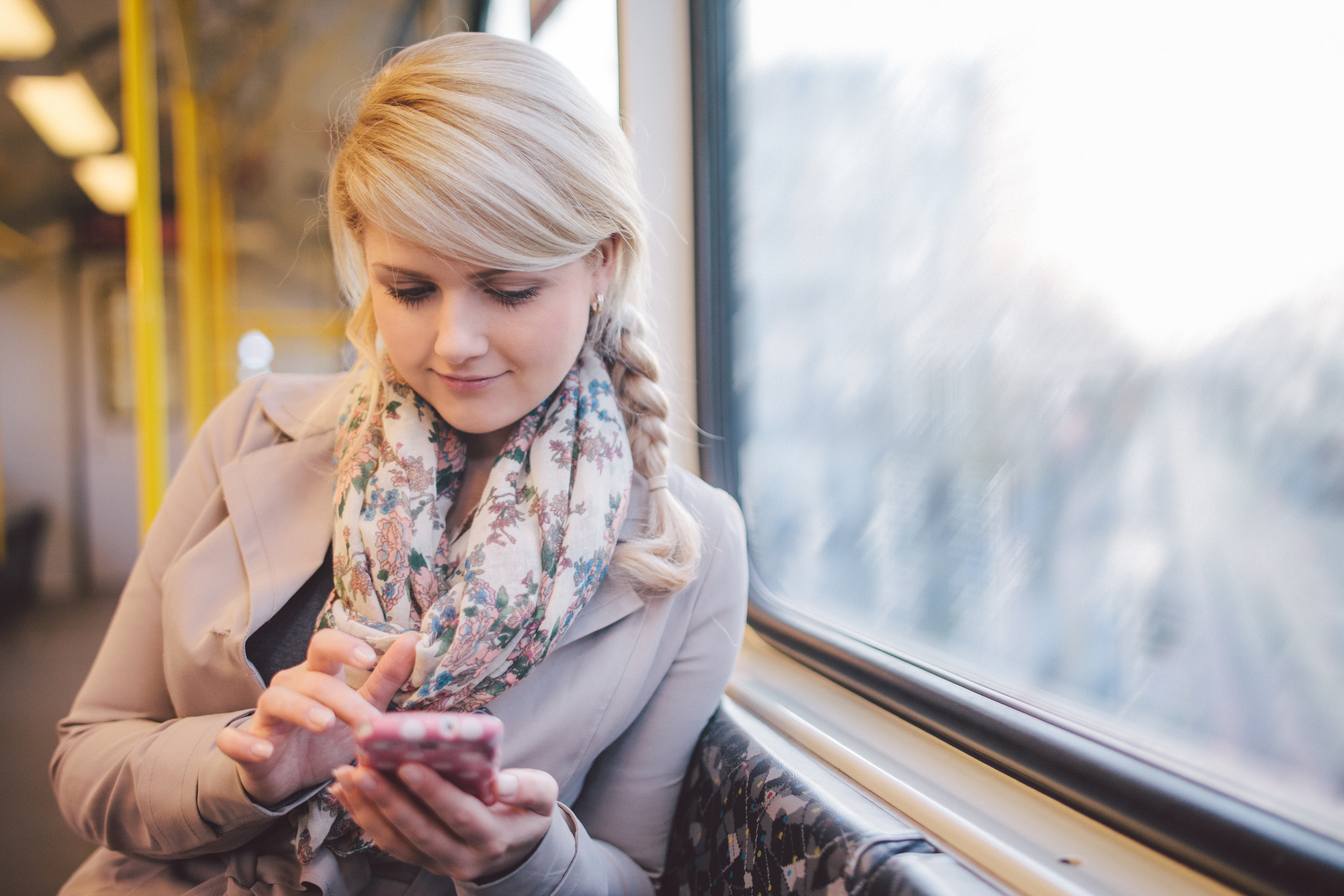 Woman using iPhone.