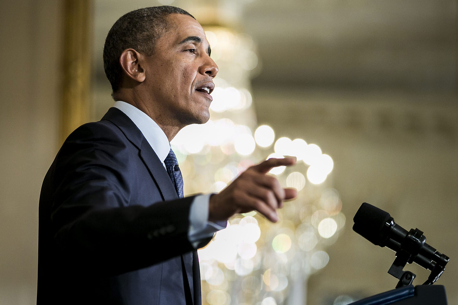 US President Barack Obama speaks about modernizing overtime protections before signing a presidential memorandum at an event in the East Room of the White House in Washington, D.C., USA, on March 13, 2014.