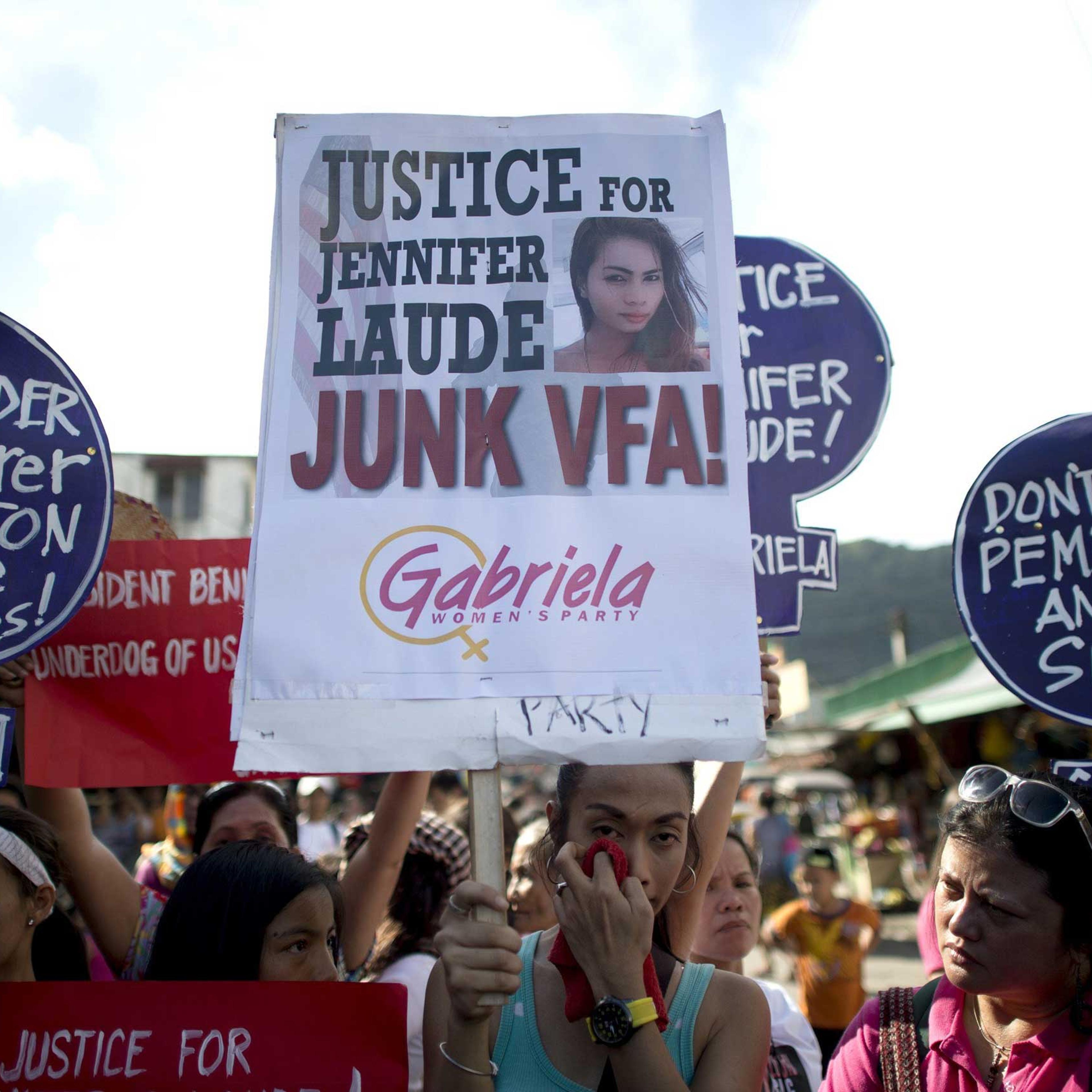 Supporters of murdered Filipino transgender Jeffrey Laude, also known as "Jennifer", hold a protest near the Hall of Justice where the preliminary hearing for the murder case is being held at the northern Philippine city of Olongapo on Oct. 10, 2014.