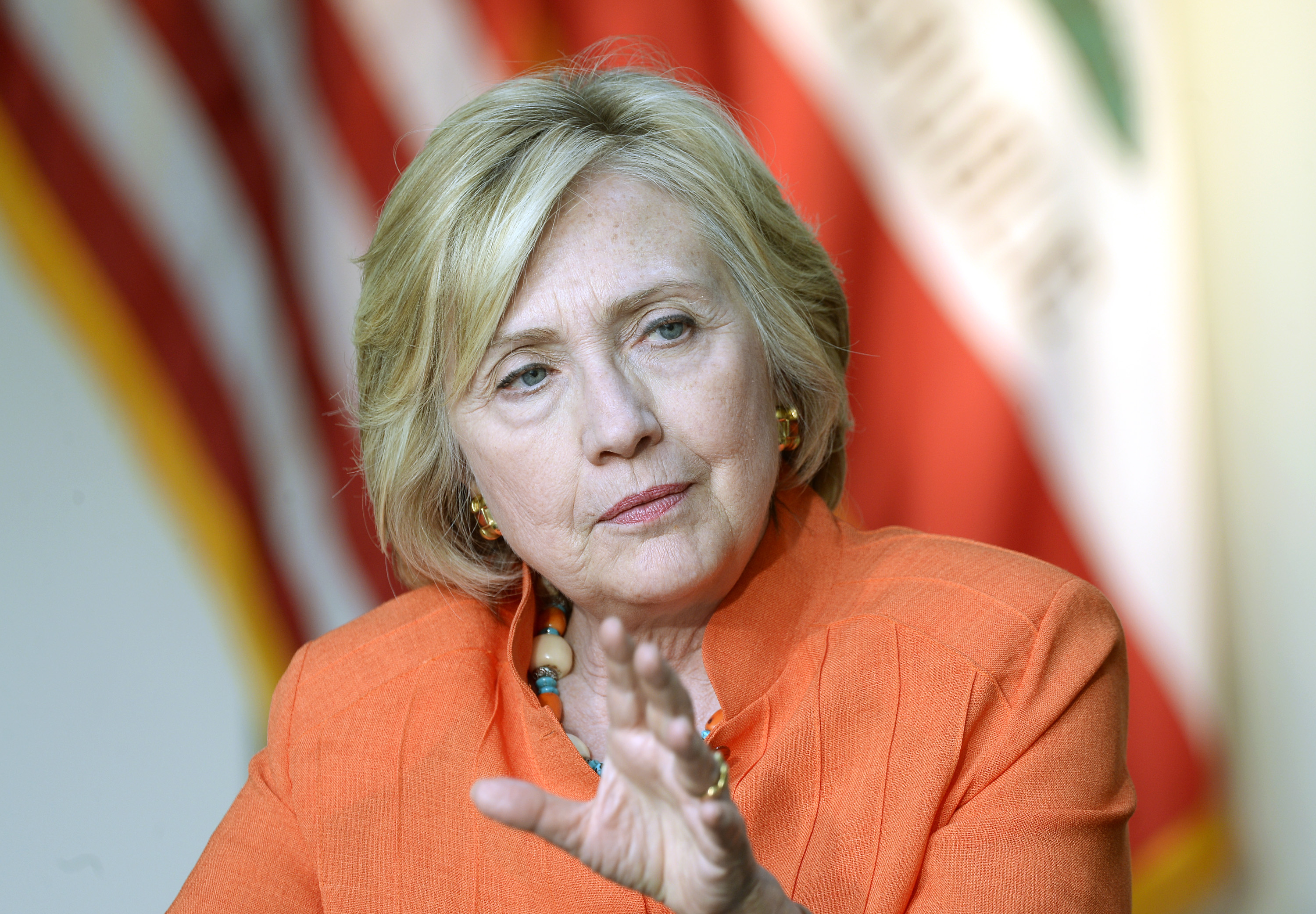 LOS ANGELES CA - AUGUST 6: Democratic Presidential hopeful and former Secretary of State Hillary Clinton (L) speaks during a Service Employees International Union event with home care providers at Los Angeles Trade Technical College August 6, 2015, in Lo