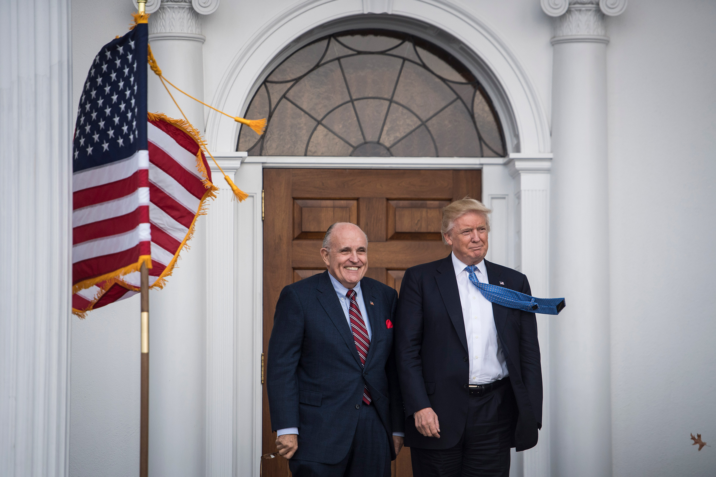 Former President Donald Trump greets Rudy Giuliani at the clubhouse at Trump National Golf Club Bedminster in Bedminster Township, N.J. on Nov. 20, 2016.