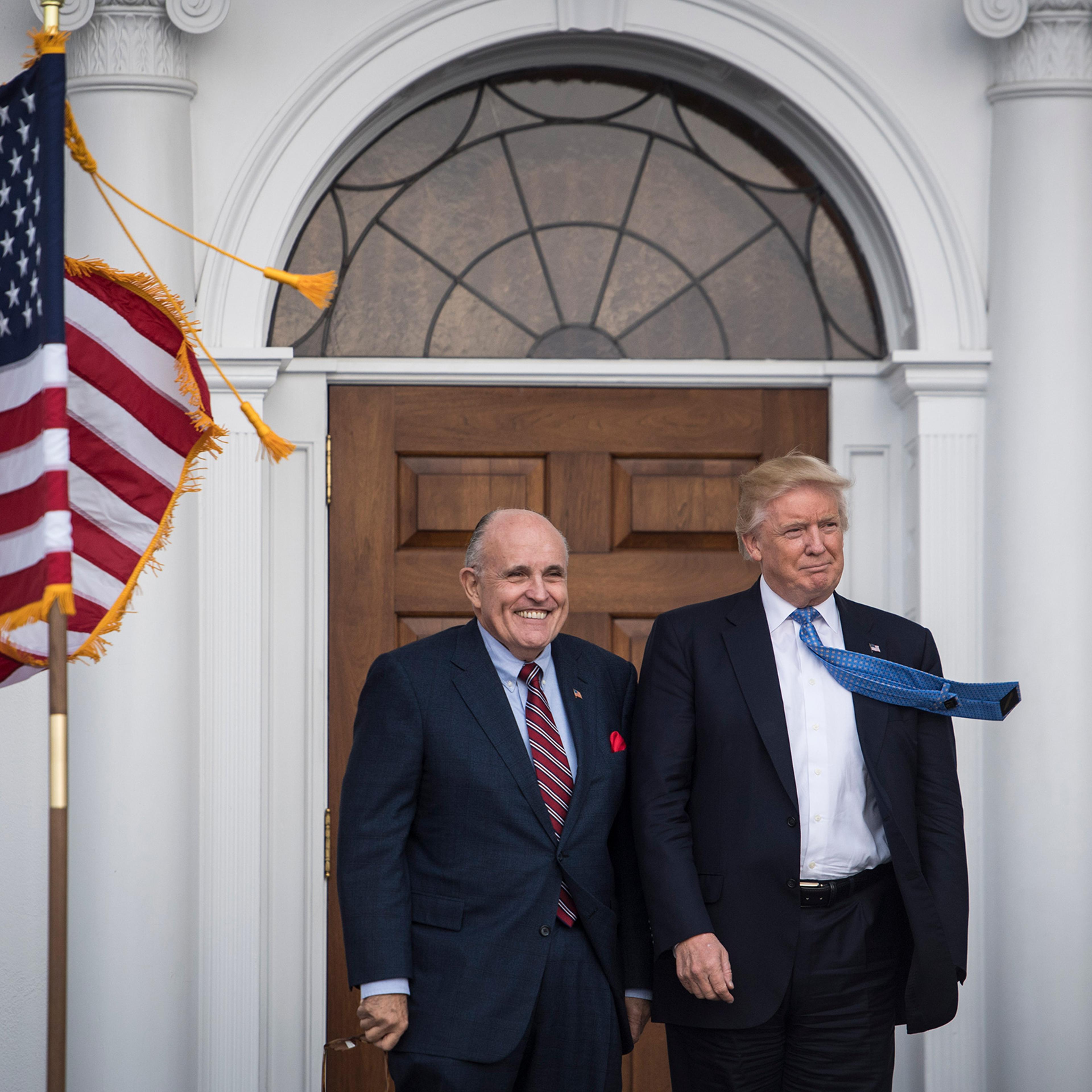 Former President Donald Trump greets Rudy Giuliani at the clubhouse at Trump National Golf Club Bedminster in Bedminster Township, N.J. on Nov. 20, 2016.