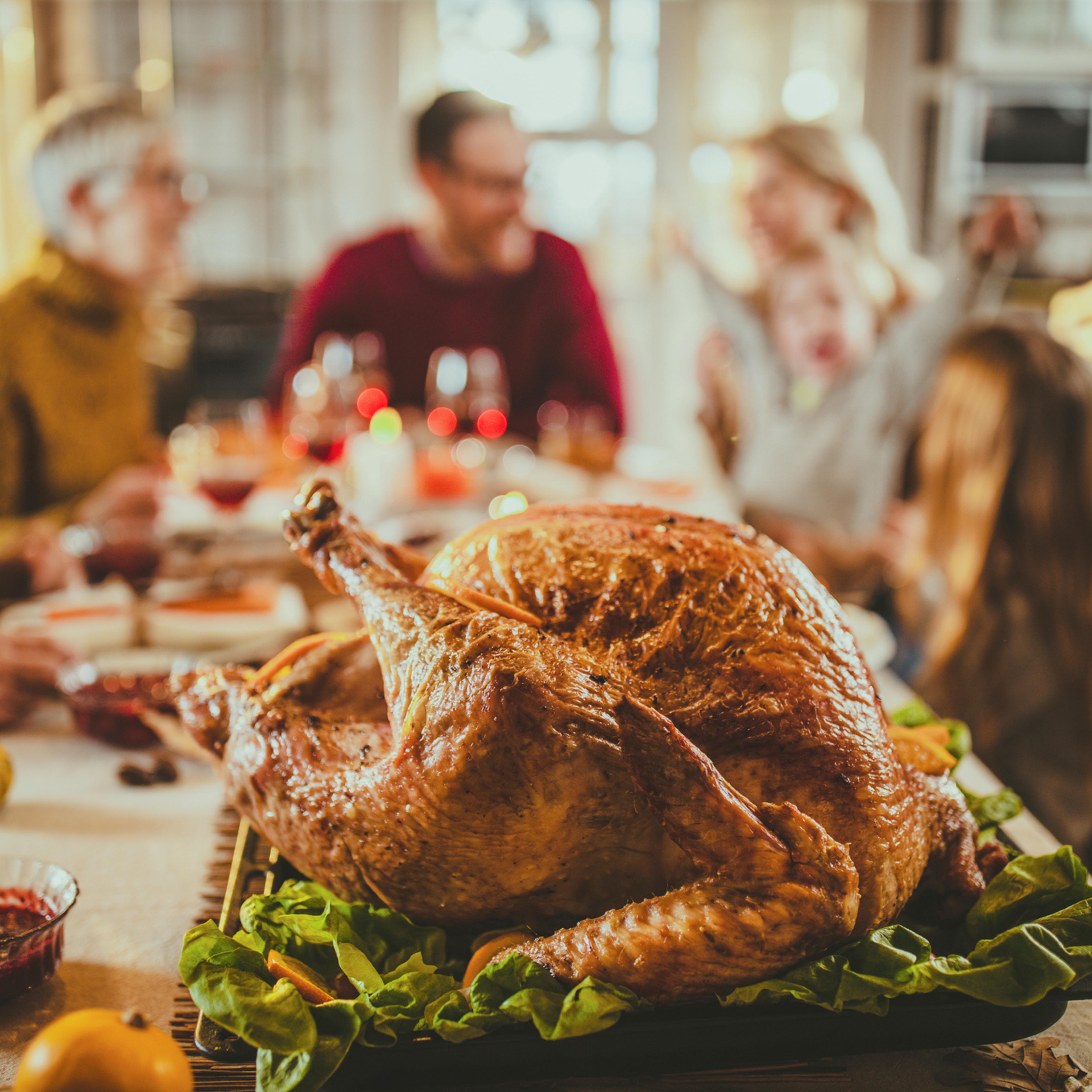 Close up of Thanksgiving turkey on dining table.