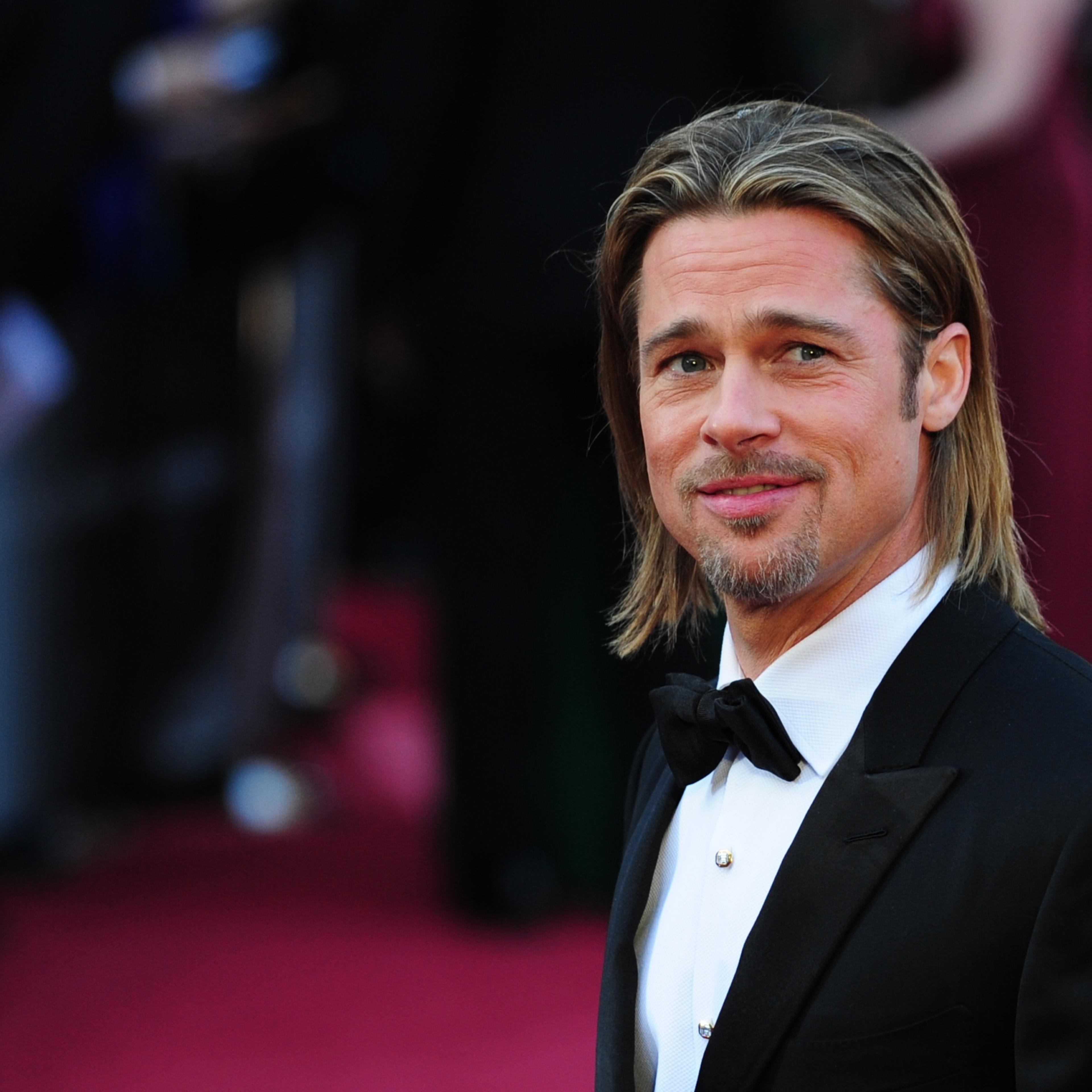 Actor Brad Pitt arrives on the red carpet for the 84th Annual Academy Awards on February 26, 2012 in Hollywood,