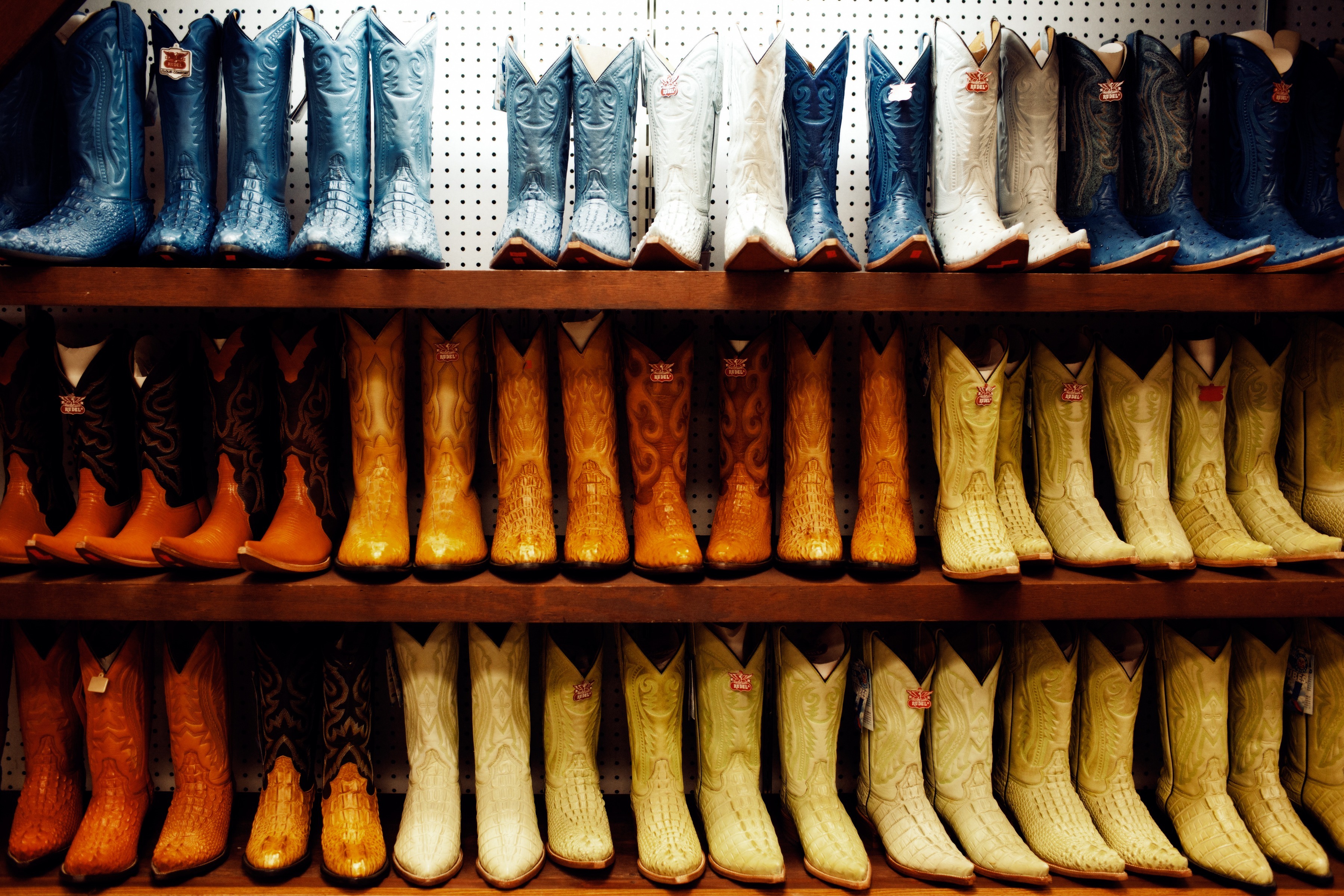 Cowboy boots in a rainbow of color for sale at José de Jésus Legaspi's La Gran Plaza.