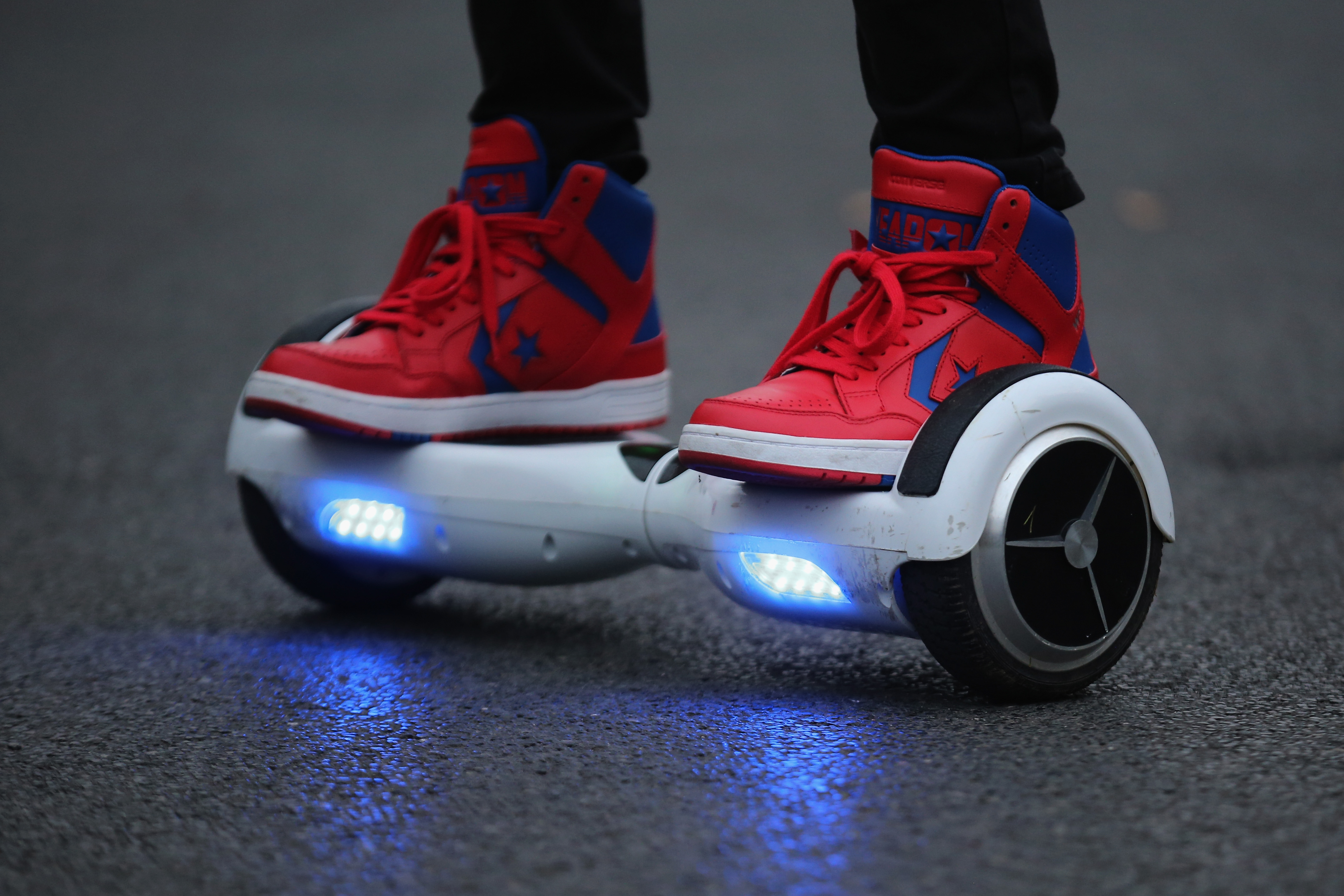 A boy poses as he rides a hoverboard, which are also known as self-balancing scooters and balance boards, on October 13, 2015 in Knutsford, England.