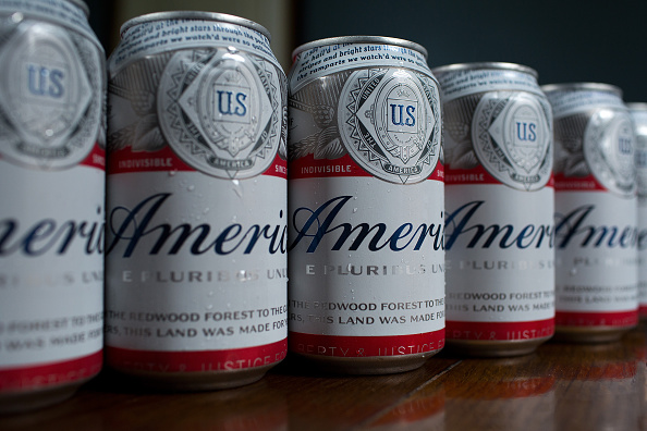 Cans of Budweiser, rebranded as 'America,' on a table