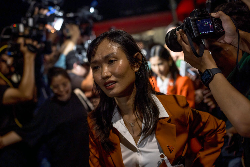 Move Forward politician and former pro-democracy activist Chonthicha "Lookate" Jangrew leaves the Thai Parliament in Bangkok on July 13, 2023.