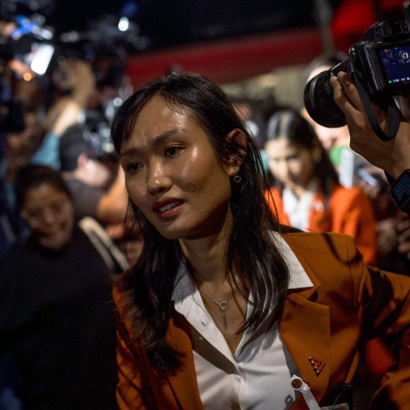 Move Forward politician and former pro-democracy activist Chonthicha "Lookate" Jangrew leaves the Thai Parliament in Bangkok on July 13, 2023.