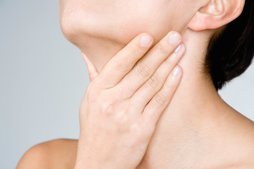 woman-hand-touching-throat
