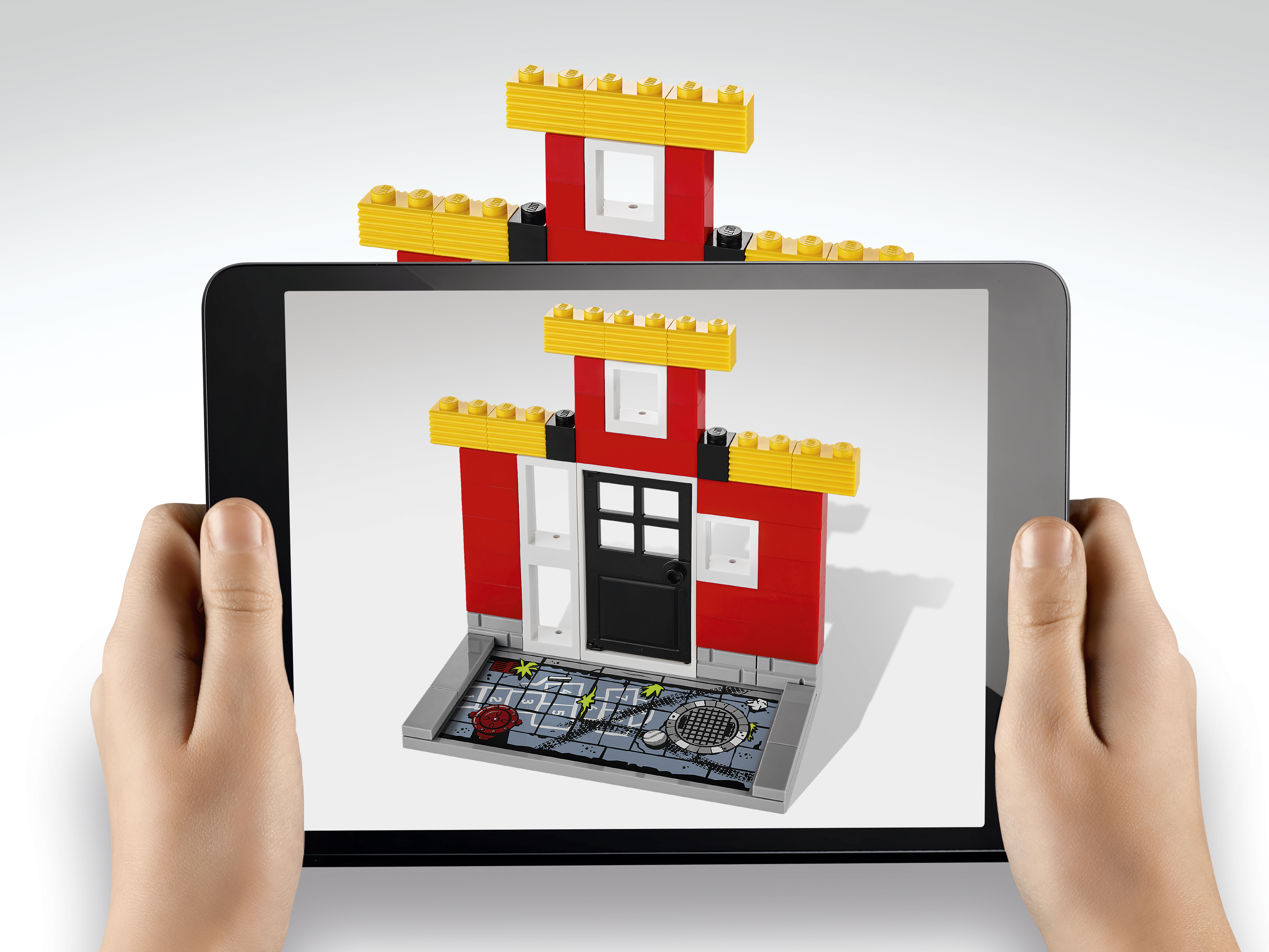 LEGO Fusion, which combines tablet games with physical bricks to blend kids' digital and physical worlds.