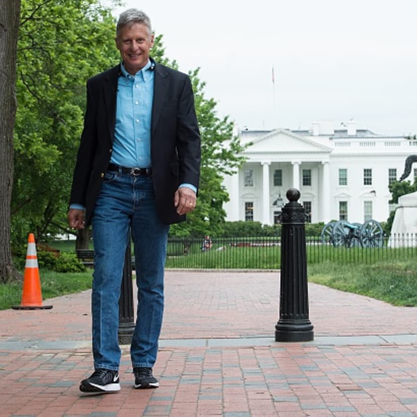 US Libertarian Party presidential candidate Gary Johnson walks in Lafayette Park across from the White House during an interview with AFP in Washington, DC, on May 9, 2016.