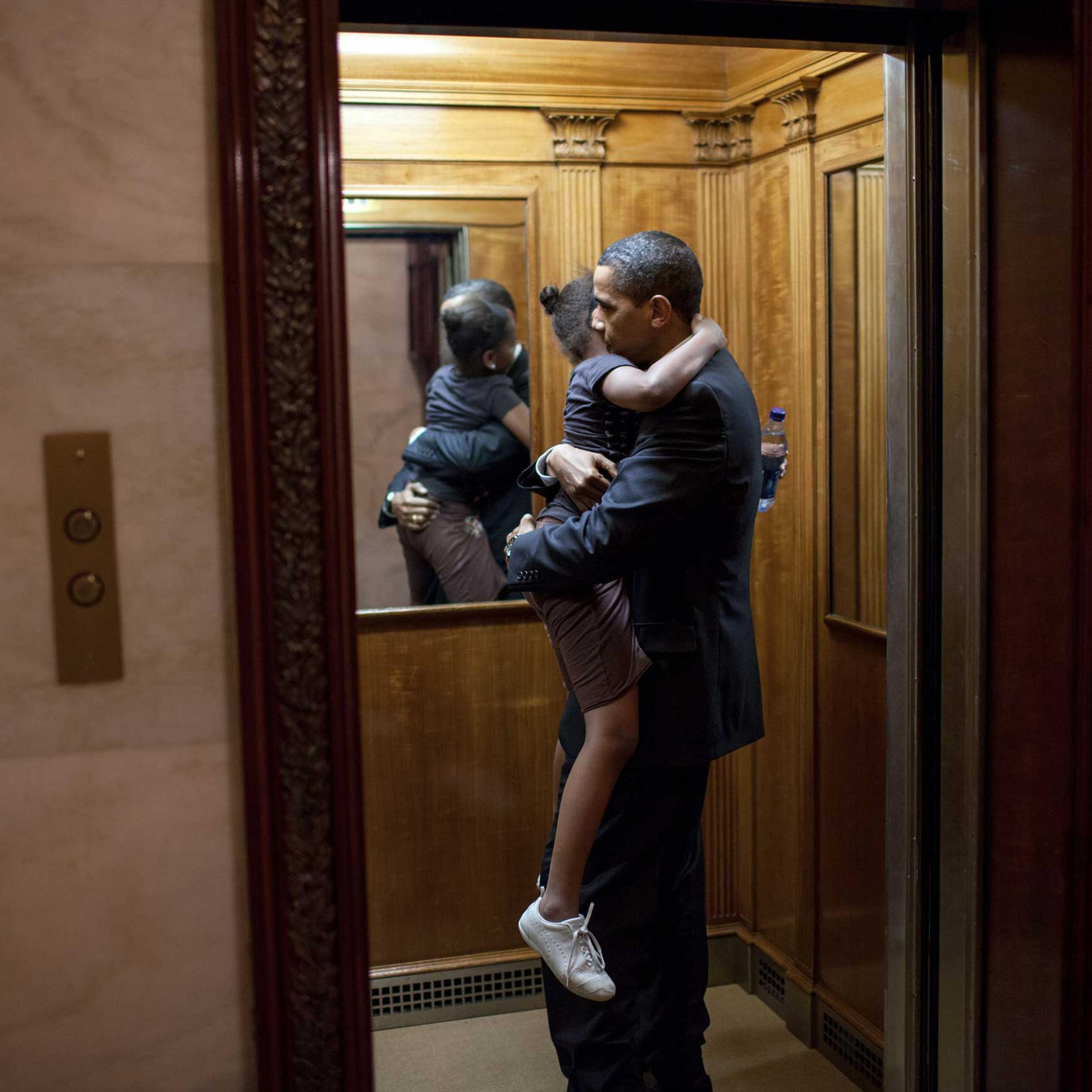 President Barack Obama was leaving the State Floor after an event and found Sasha in the elevator ready to head upstairs to the private residence. He decided to ride upstairs with her before returning to the Oval Office, May 19, 2009. (Official White Hou