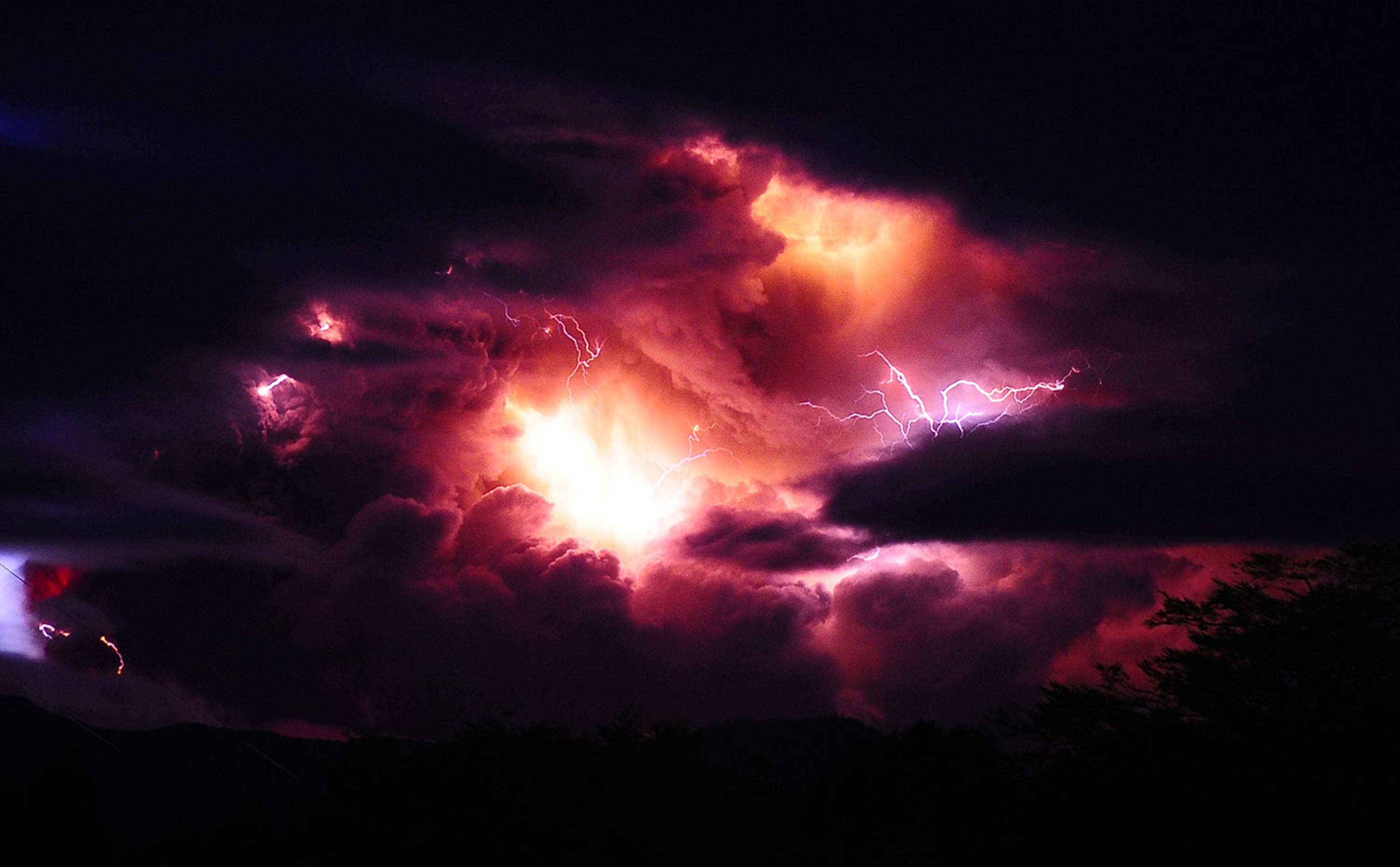 Ash billowing from Puyehue volcano as lightning strikes in southern Chile on June 5, 2011.