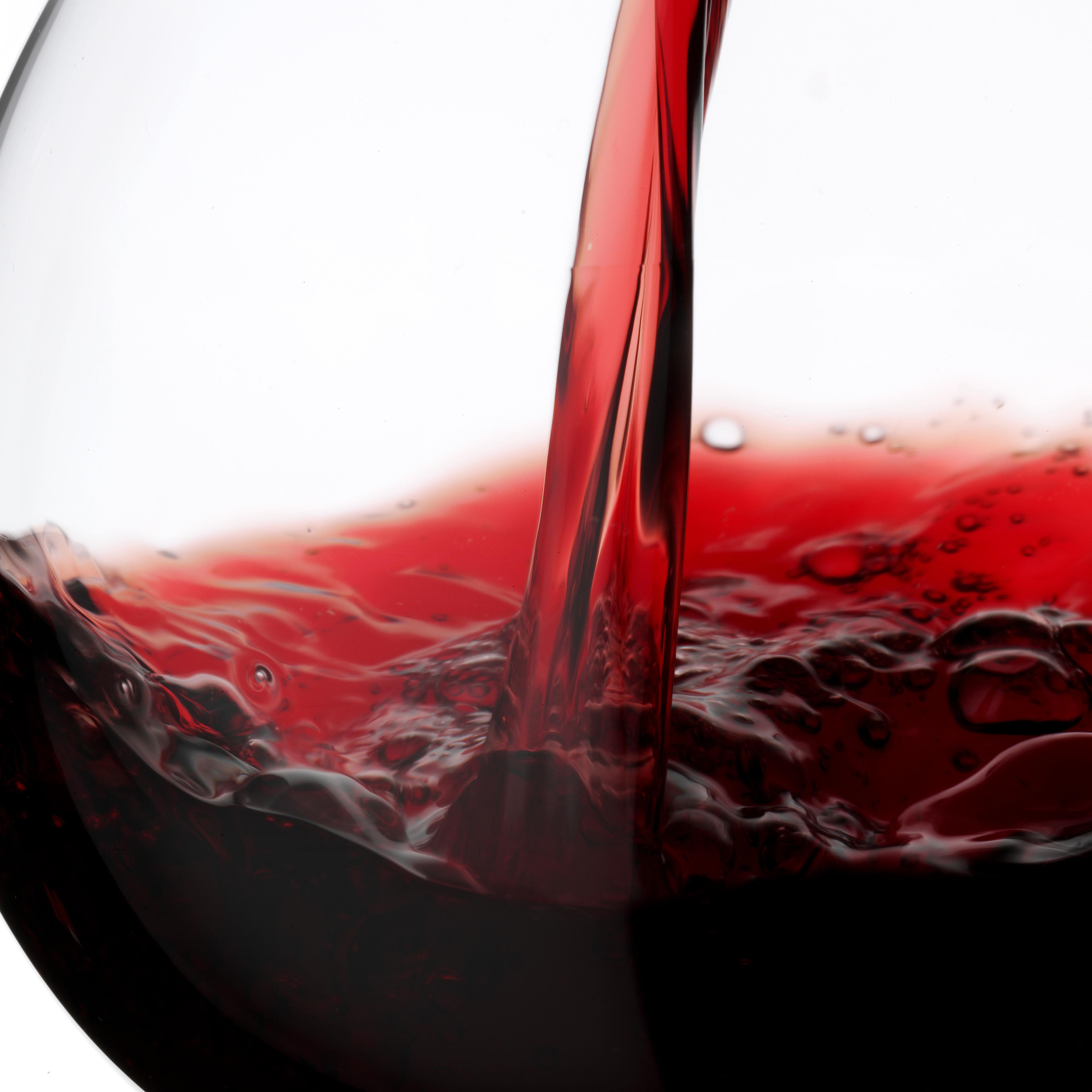 Red Wine Pouring into Glass