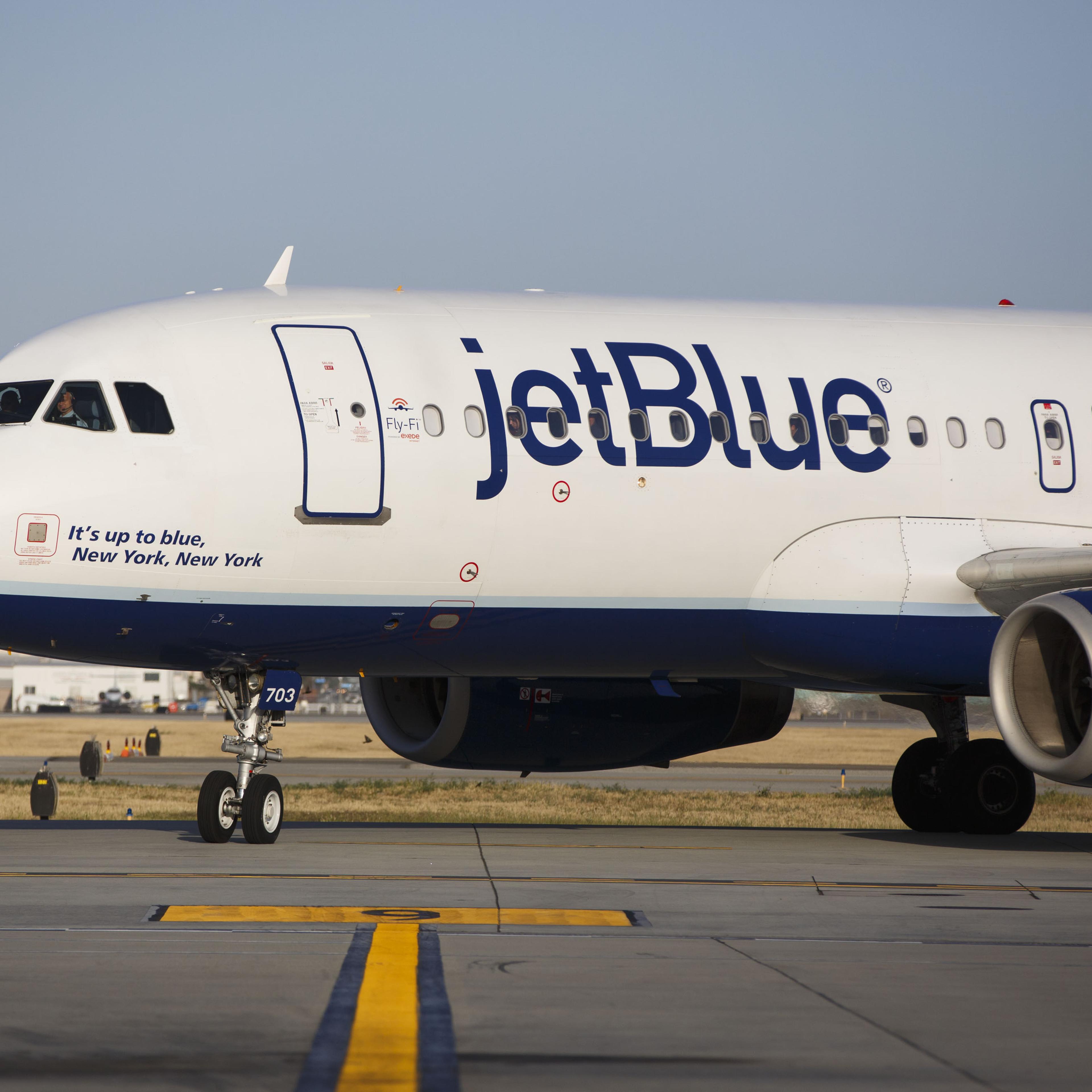 A JetBlue Airways Corp. Airbus Group SE A320 aircraft taxis to the gate on the tarmac at Long Beach Airport in Long Beach, California, on April 25, 2016.