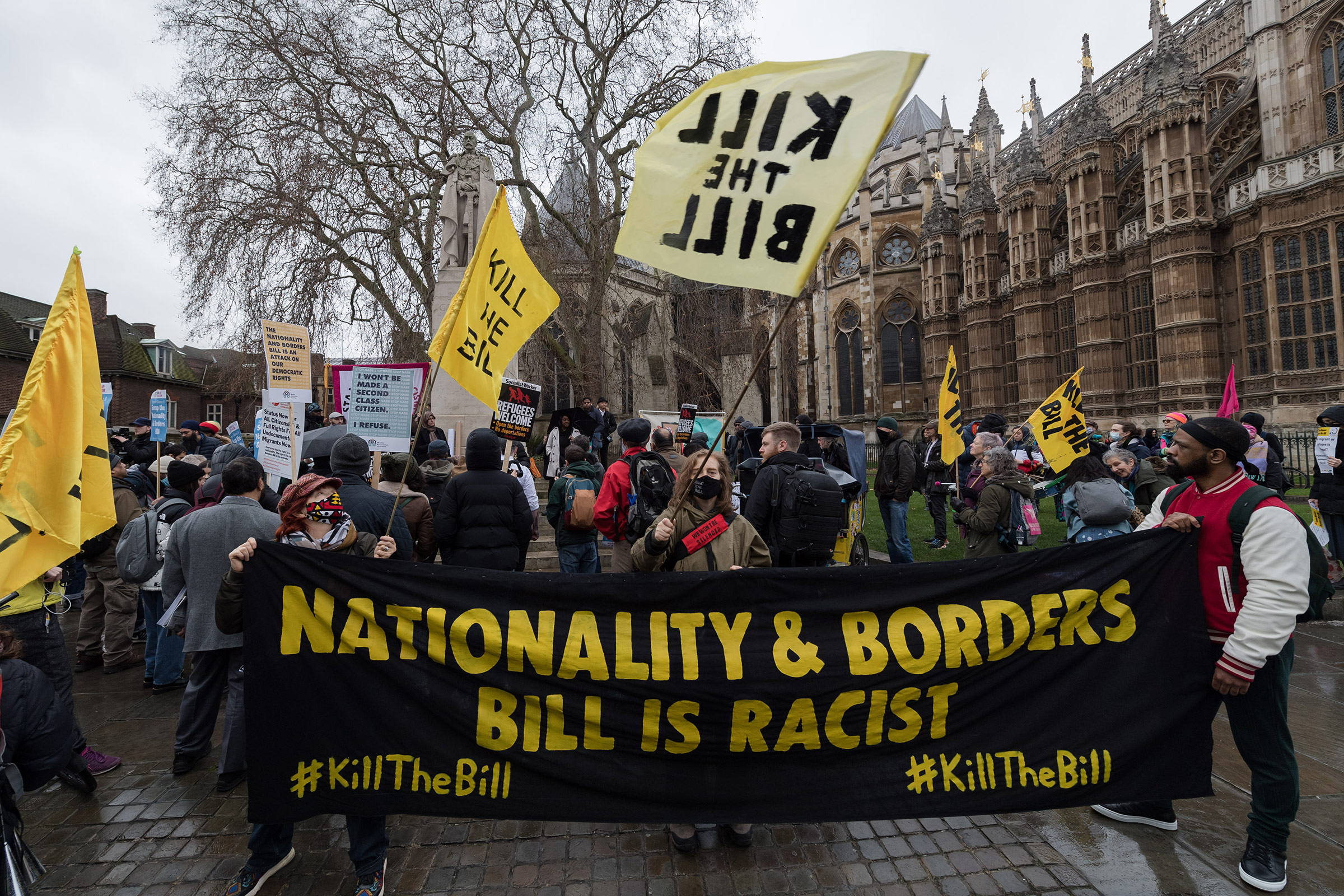Activists stage a protest outside Houses of Parliament against the Nationality and Borders Bill in London on Jan. 27, 2022.